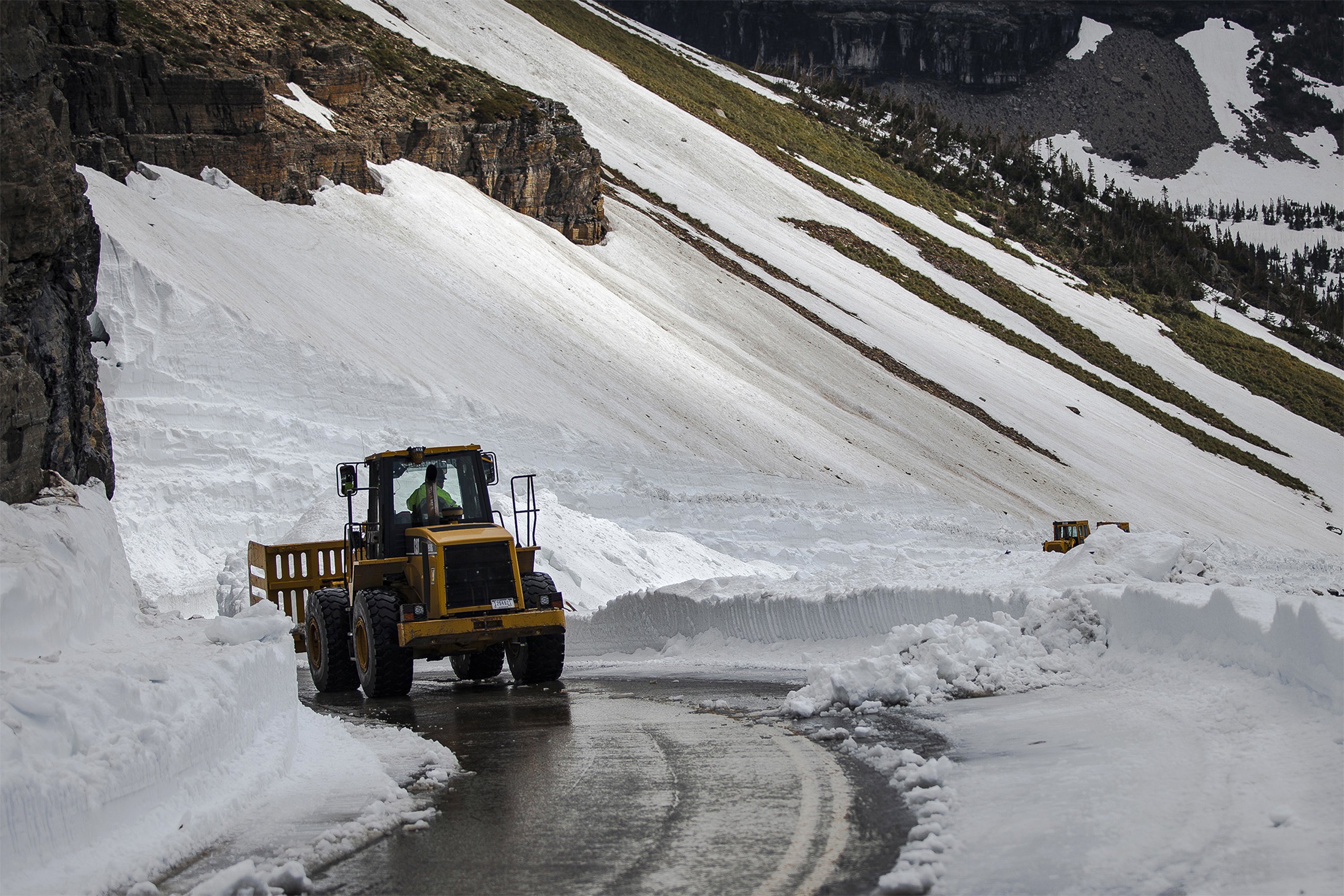 Plow crews clear Glacier National Park thoroughfare AP News