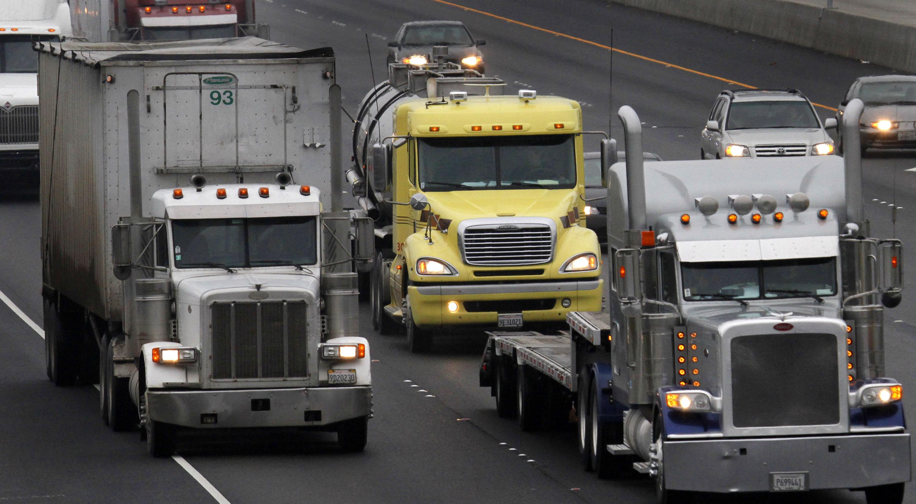 BOSTON (AP) — Officials from companies with fleets of trucks are urging governors across the country to embrace a rule meant to speed the adoption o