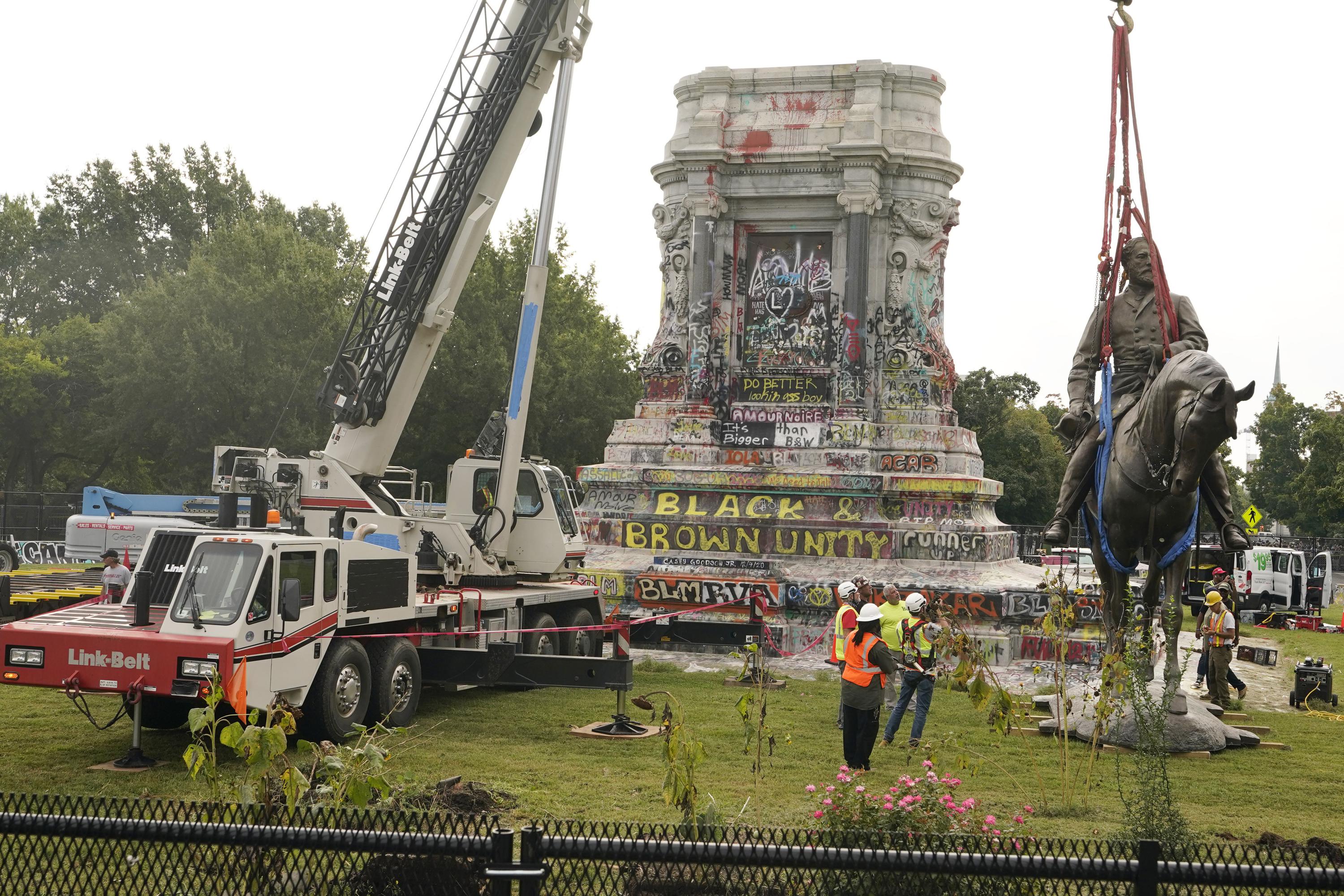 Gen. Lee statue comes down in former Confederate capital | AP News