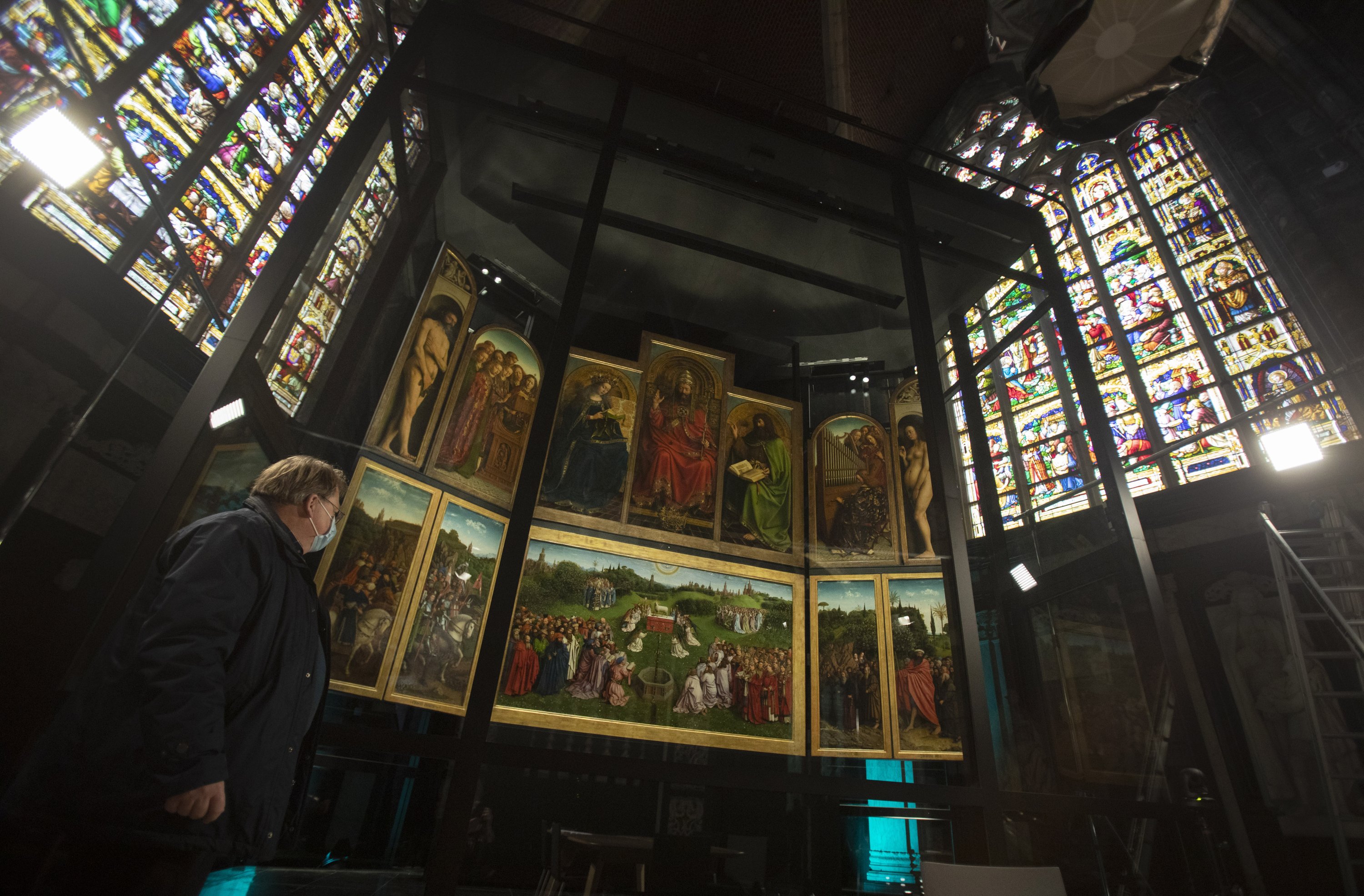 Belgium shows restored masterpiece, but stolen panel irritates
