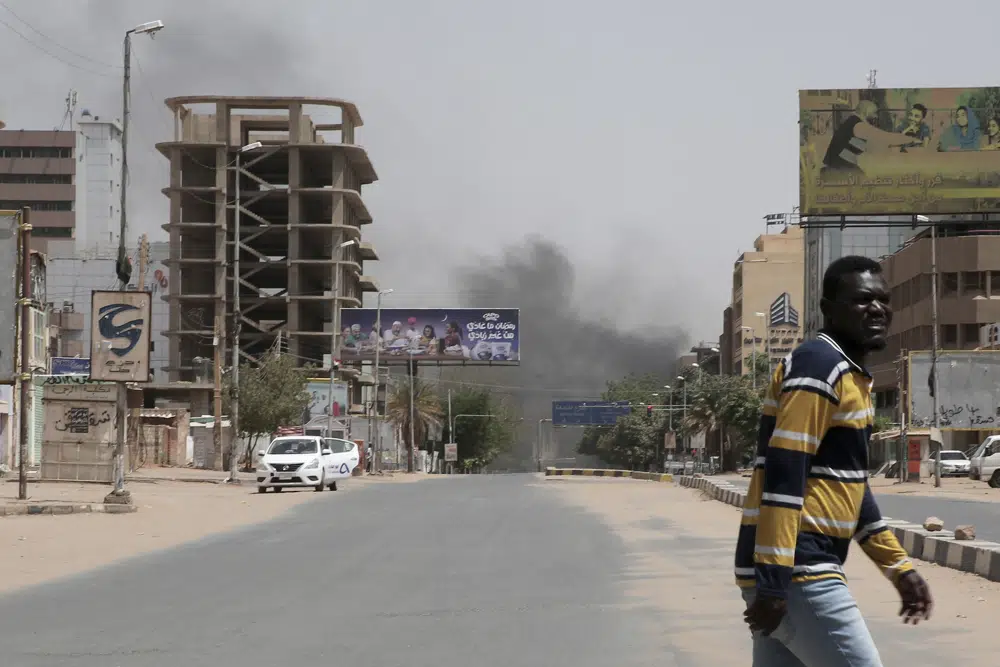 Smoke is seen rising from a neighborhood in Khartoum, Sudan, Saturday, April 15, 2023. Fierce clashes between Sudan’s military and the country’s powerful paramilitary erupted in the capital and elsewhere in the African nation after weeks of escalating tensions between the two forces. The fighting raised fears of a wider conflict in the chaos-stricken nation. (AP Photo/Marwan Ali)