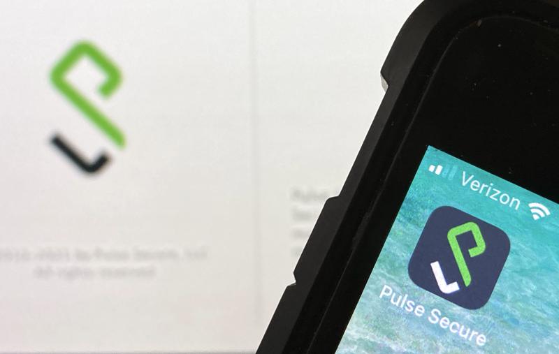 An Icon for the Pulse Secure smartphone app, right, and a computer desktop info page, left, are seen in Burke, Va., on Monday, June 14, 2021. Suspected state-backed Chinese hackers penetrated the computer systems of critical U.S. entities in what cybersecurity experts are calling a major Chinese cyberespionage campaign, an episode that’s gone largely under the radar amid the clamor of worsening ransomware attacks. The campaign was carried out by exploiting the widely used Pulse Connect Secure networking devices. Pulse Secure is used by numerous companies and governments for secure remote access to their networks. (AP Photo) pulse connect secure hack