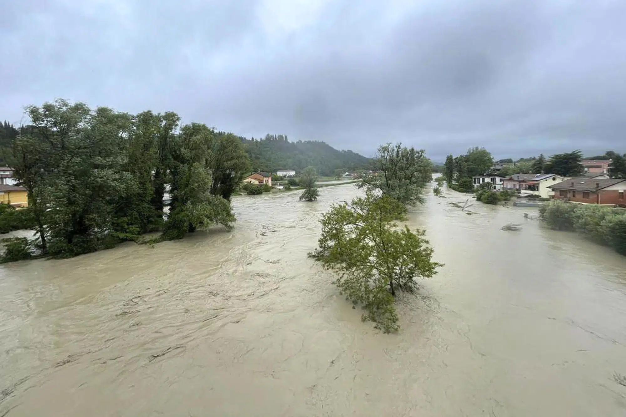 Exceptional rains in drought-stricken northern Italy kill 8 and cancel the Formula 1 Grand Prix