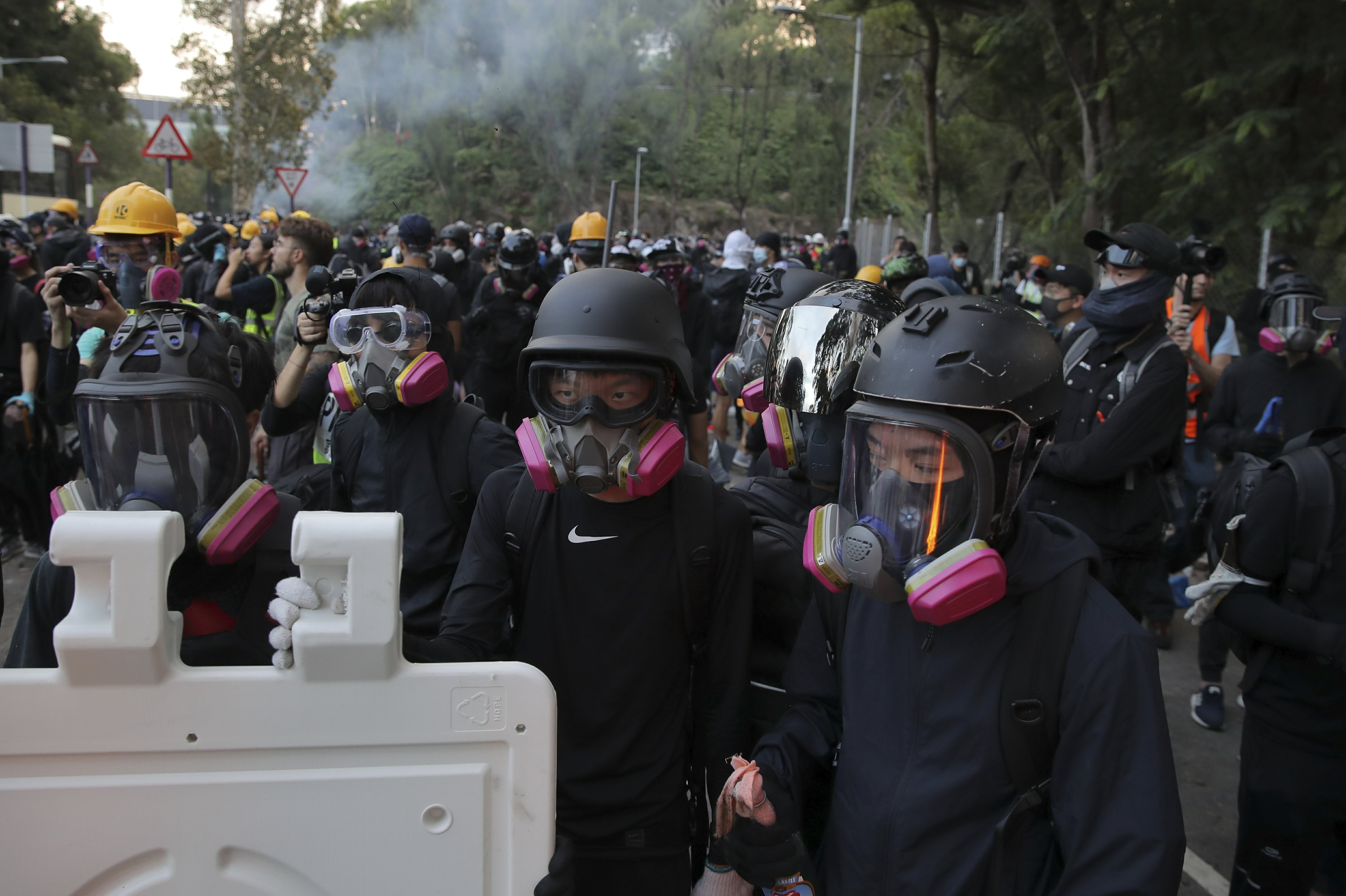 Tear gas and fires Hong Kong protests from morning to night AP News
