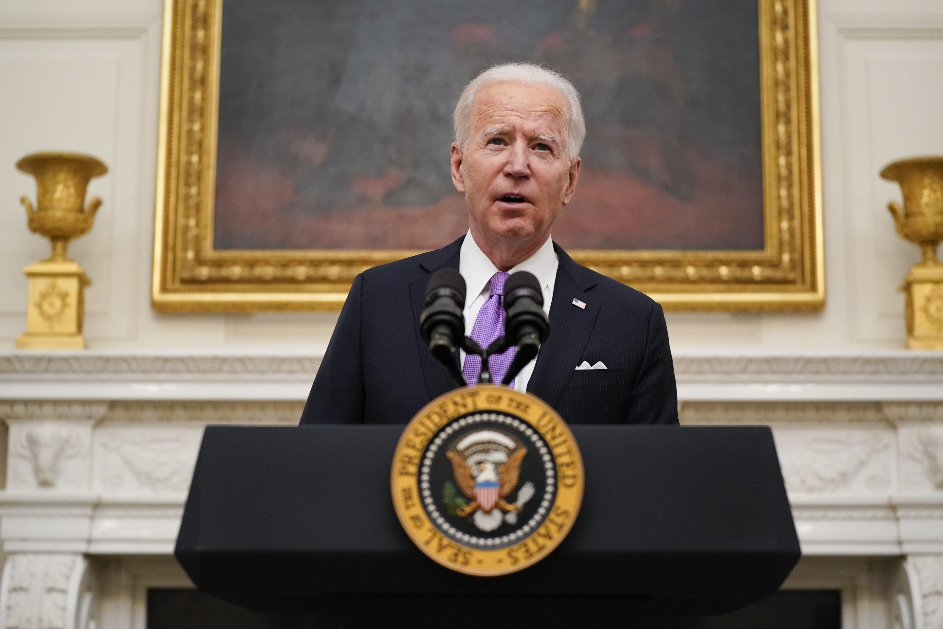 Biden signs burst of virus orders, vows 'Help is on the way'