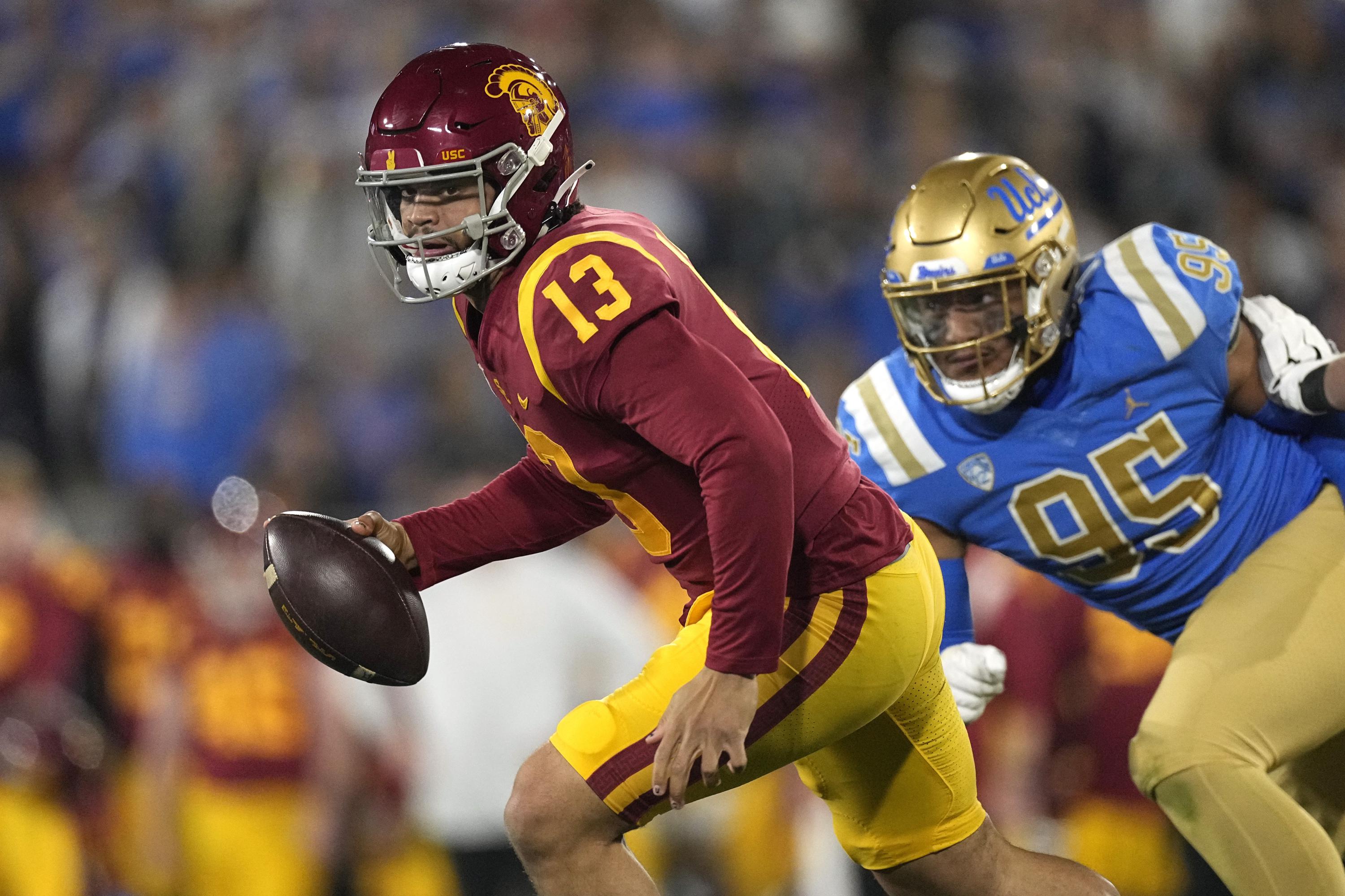Rivalry week picks: From Egg Bowl to Apple Cup to The Game | AP News