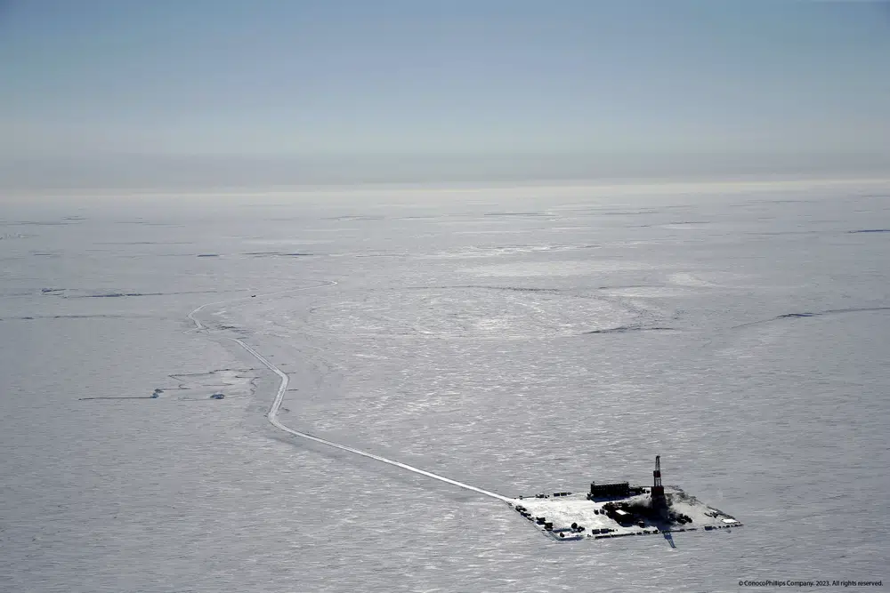 FILE - This 2019 aerial photo provided by ConocoPhillips shows an exploratory drilling camp at the proposed site of the Willow oil project on Alaska's North Slope. The Biden administration issued a long-awaited study on Wednesday, Feb. 1, 2023, that recommends allowing three oil drilling sites in the region of far northern Alaska. The move, while not final, has angered environmentalists who see it as a betrayal of President Joe Biden's pledges to reduce carbon emissions and promote green energy. (ConocoPhillips via AP)