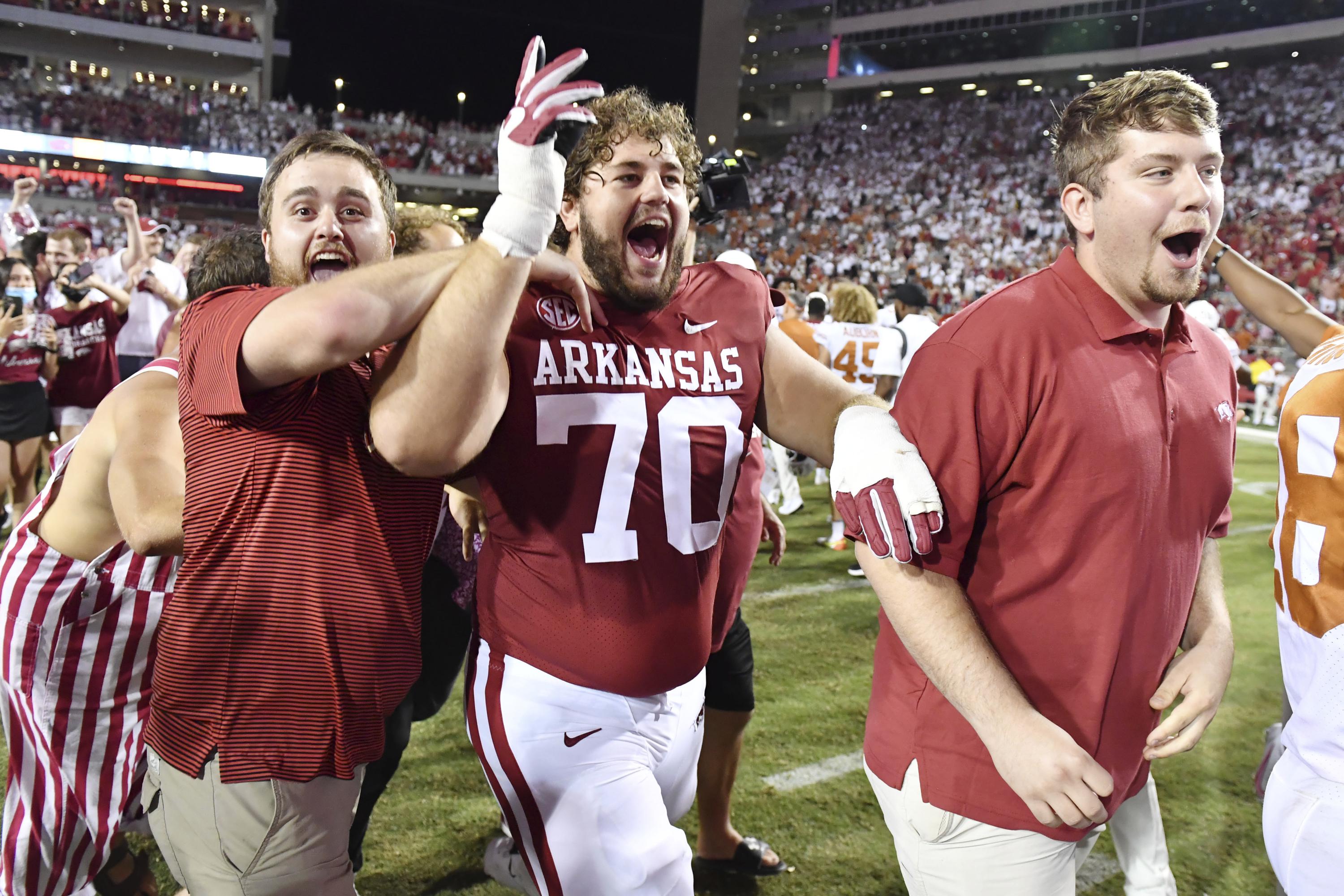 Arkansas manhandles No. 15 Texas, 4021, crowd rushes field AP News