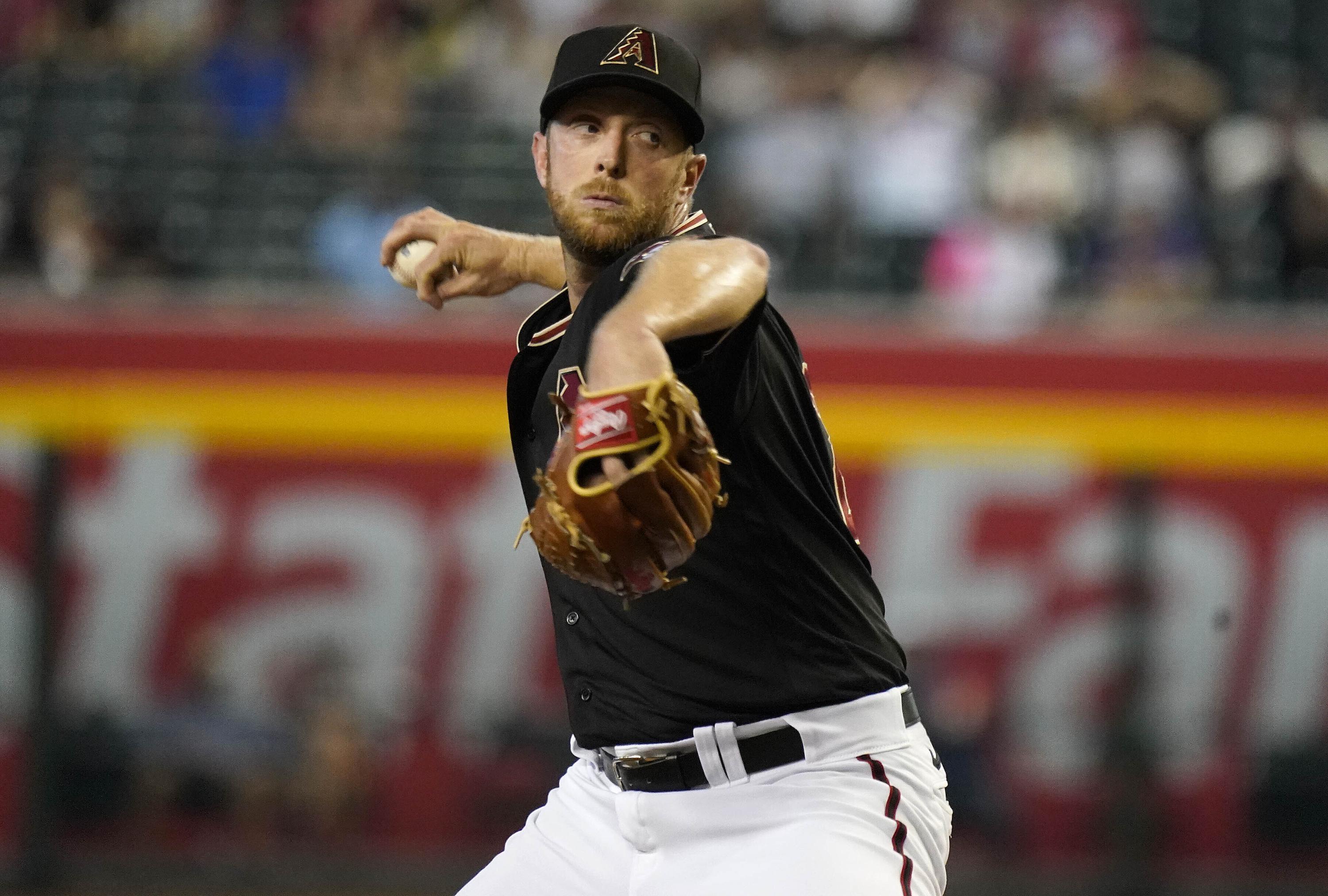 Kelly stops Giants again, Diamondbacks win 5-2 | AP News