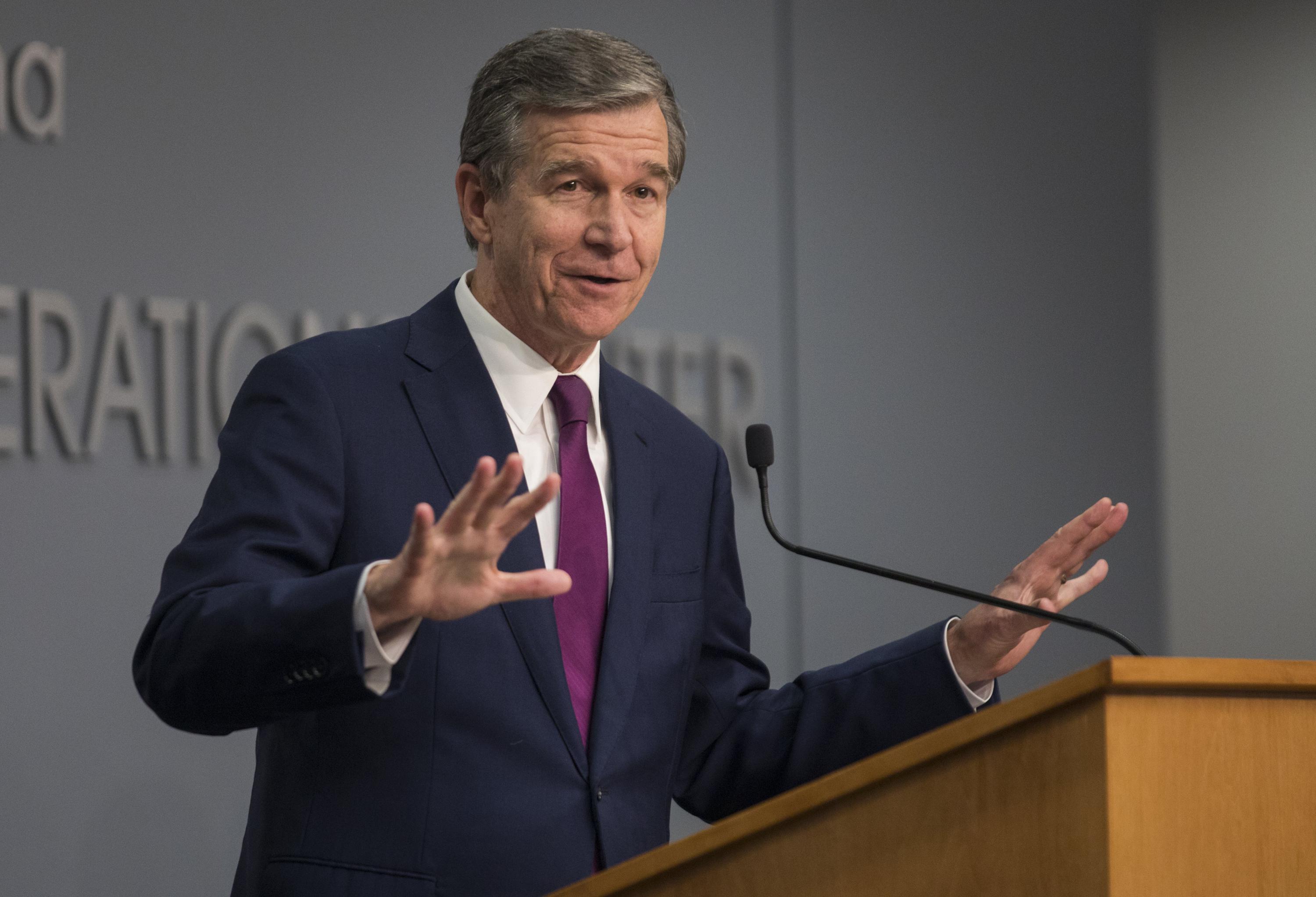 Cooper moves to end North Carolina's statewide mask mandate | AP News