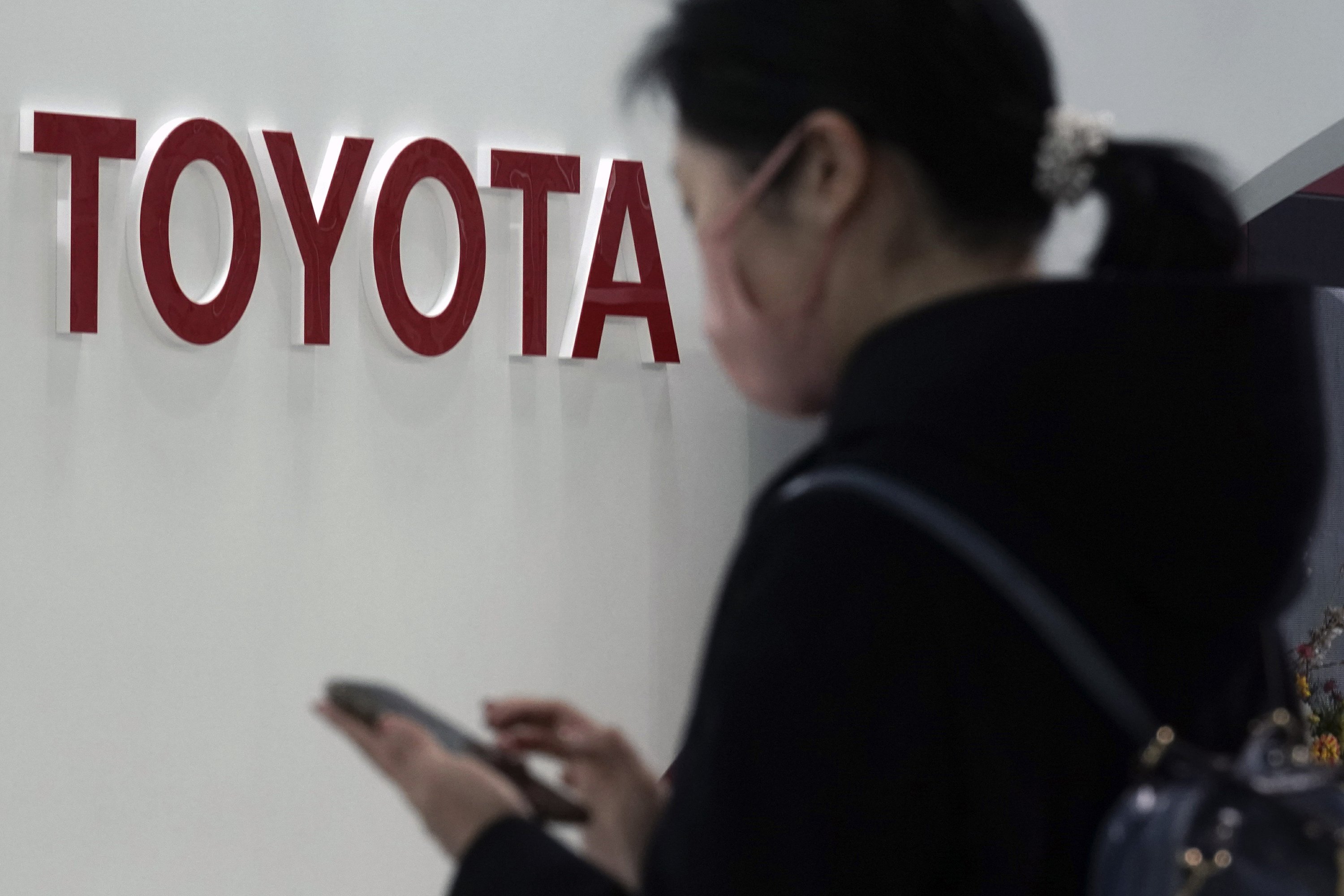 Toyota's profit plunges as pandemic halves vehicle sales