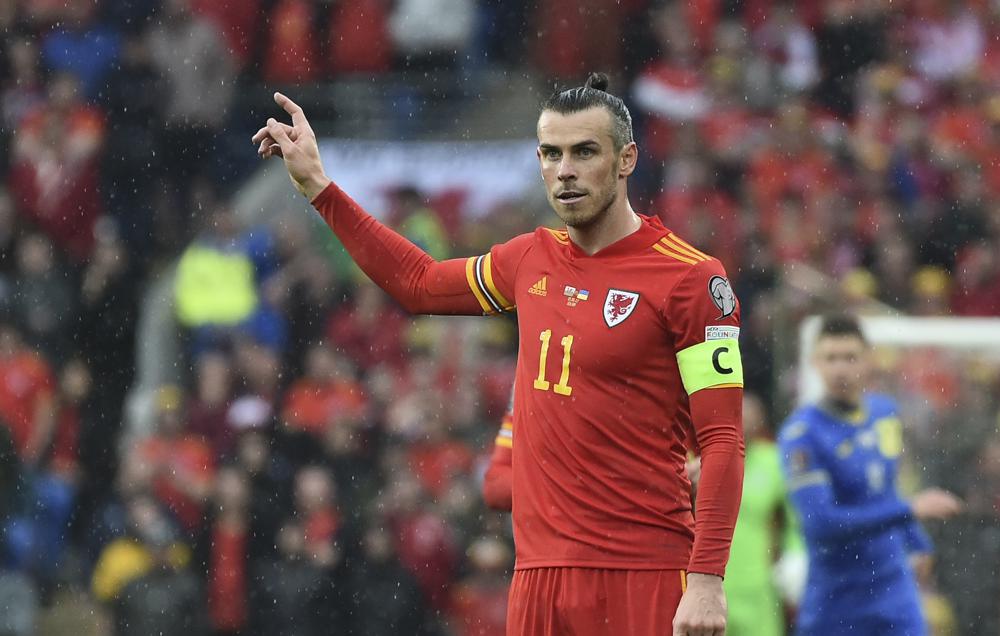 Wales' Gareth Bale during the World Cup 2022 qualifying play-off soccer match between Wales and Ukraine at Cardiff City Stadium, in Cardiff, Wales, Sunday, June 5, 2022. (AP Photo/Rui Vieira)