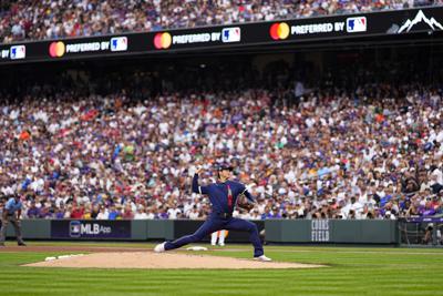 American League's starting pitcher Shohei Ohtani, of the Los Angeles Angeles, throws during the first inning of the MLB All-Star baseball game, Tuesday, July 13, 2021, in Denver. (AP Photo/Jack Dempsey)