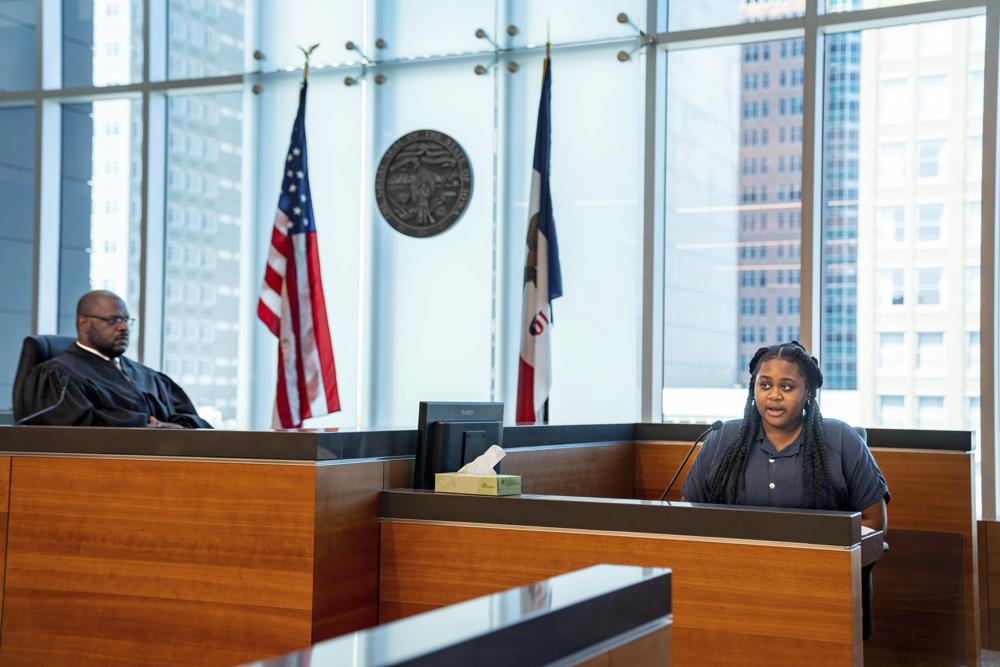 Pieper Lewis gives her allocution during a sentencing hearing, Tuesday, Sept. 13, 2022, in Des Moines, Iowa. Lewis, who was initially charged with first-degree murder after she stabbed her accused rapist to death in June 2020, was sentenced to five years of closely supervised probation and ordered to pay $150,000 restitution to the man’s family. (Zach Boyden-Holmes/The Des Moines Register via AP)