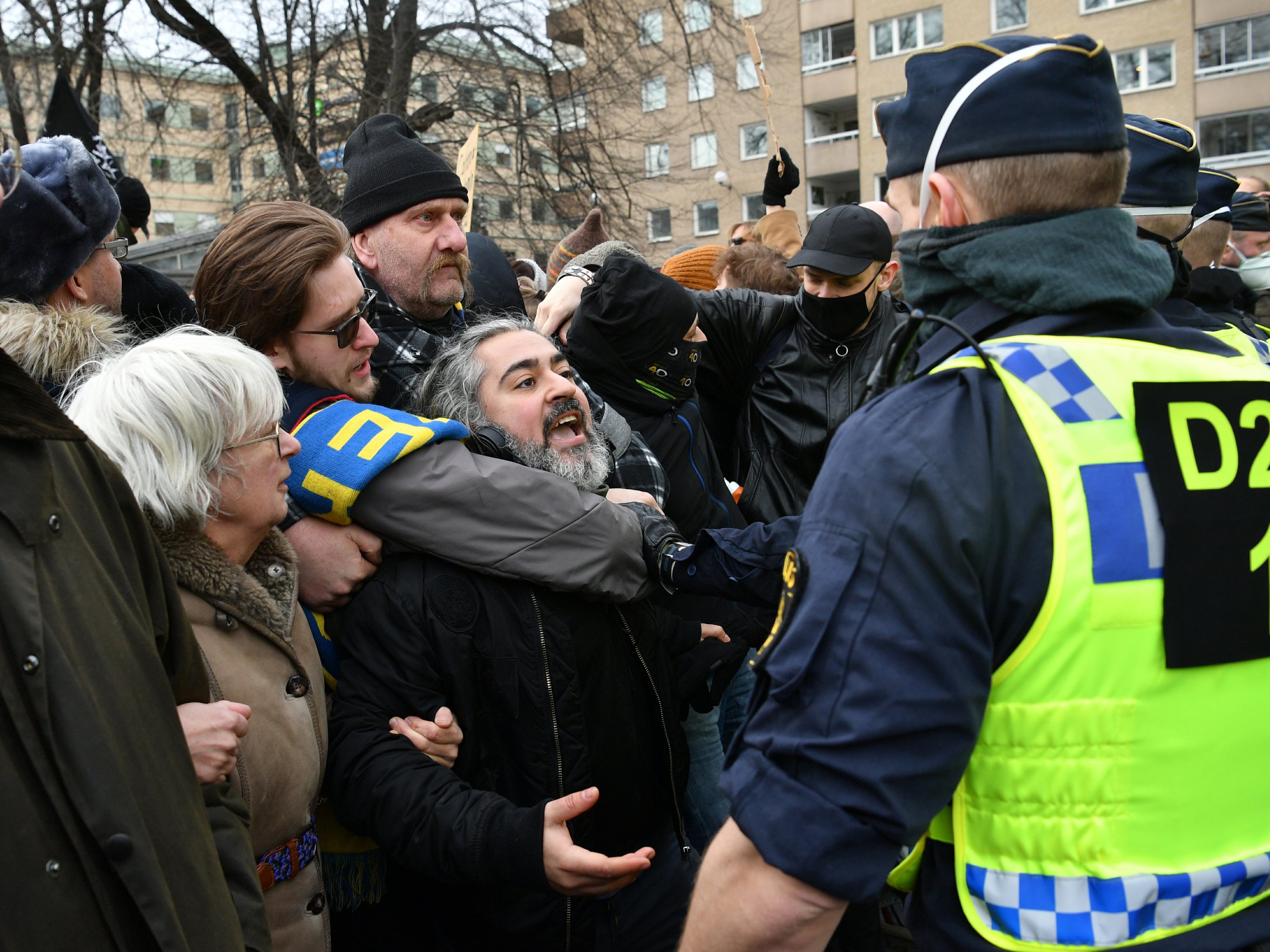 Hundreds in Stockholm protest Sweden’s virus restrictions