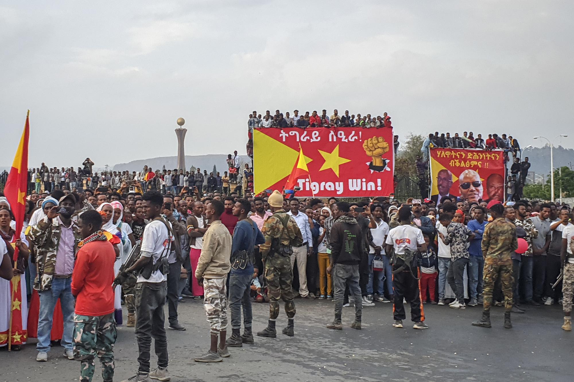 Tigrayans gather to see Tigray's president Debretsion Gebremichael speaking in public for the first time after the capture of the regional capital by Tigray forces, in Mekele, in the Tigray region of northern Ethiopia on Thursday, July 1, 2021. Tigray leaders have rejected a unilateral cease-fire that Ethiopia’s government announced as its soldiers retreated from Mekele, and they have vowed to chase “enemies” out of the rest of the Tigray region. (AP Photo)
