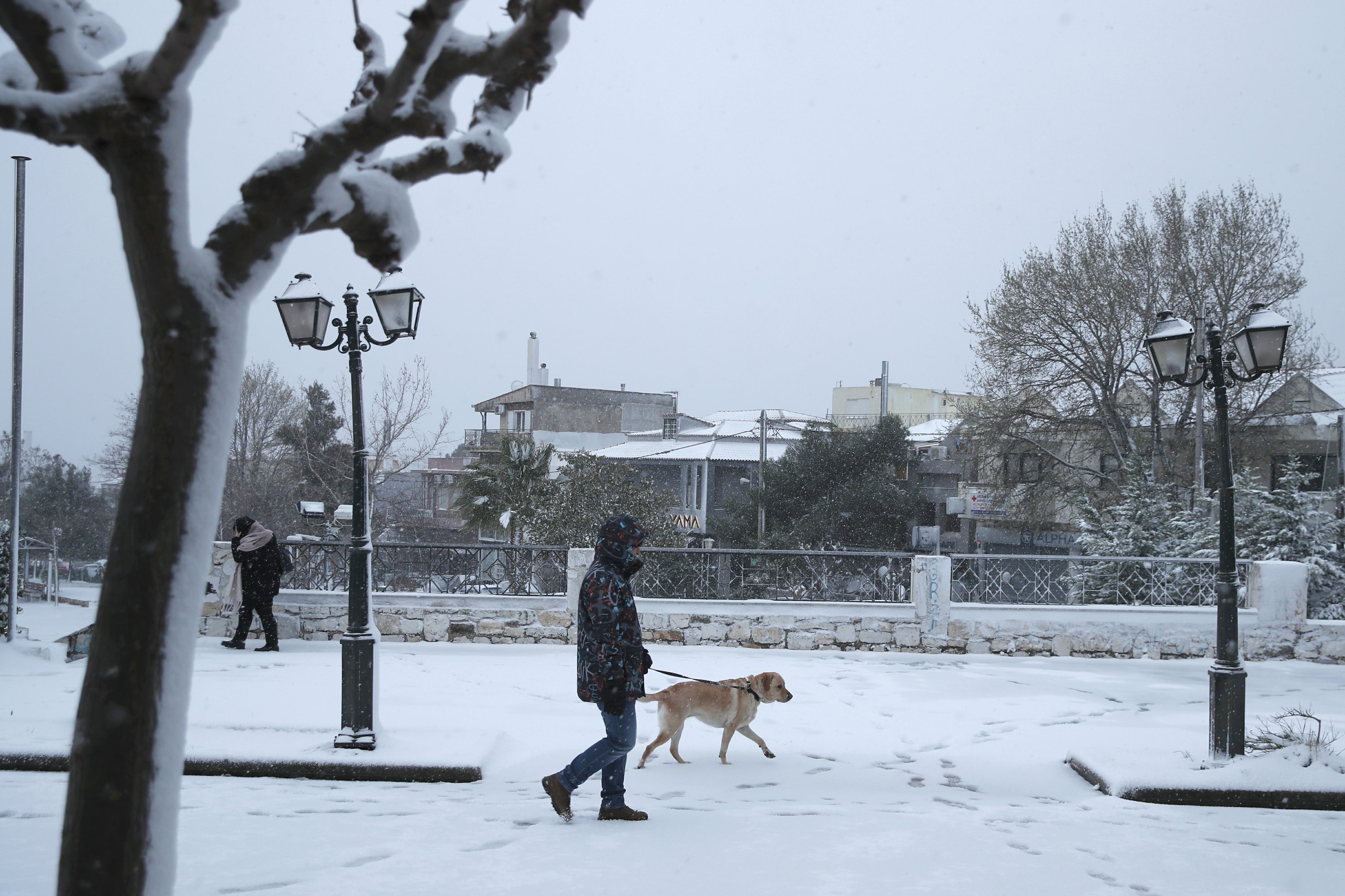 Cold weather front hits Greece, with snow in Athens AP News