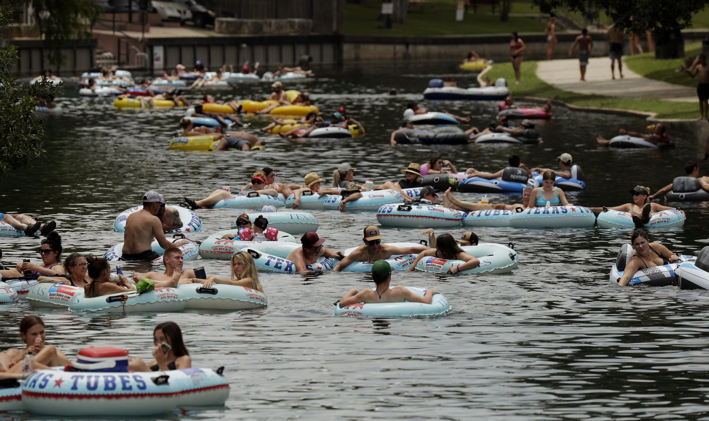 Texas shuts down bars as hospitalizations surpass 5,000 AP News