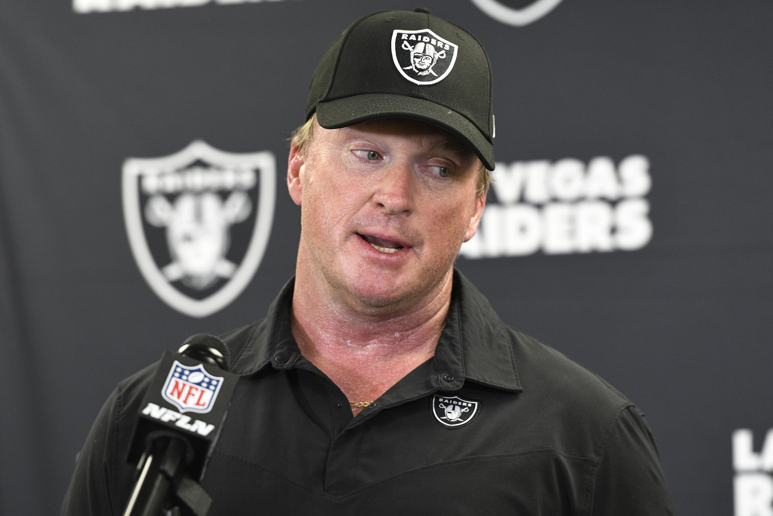 Jon Gruden resigns as Raiders coach over offensive emails | AP News
