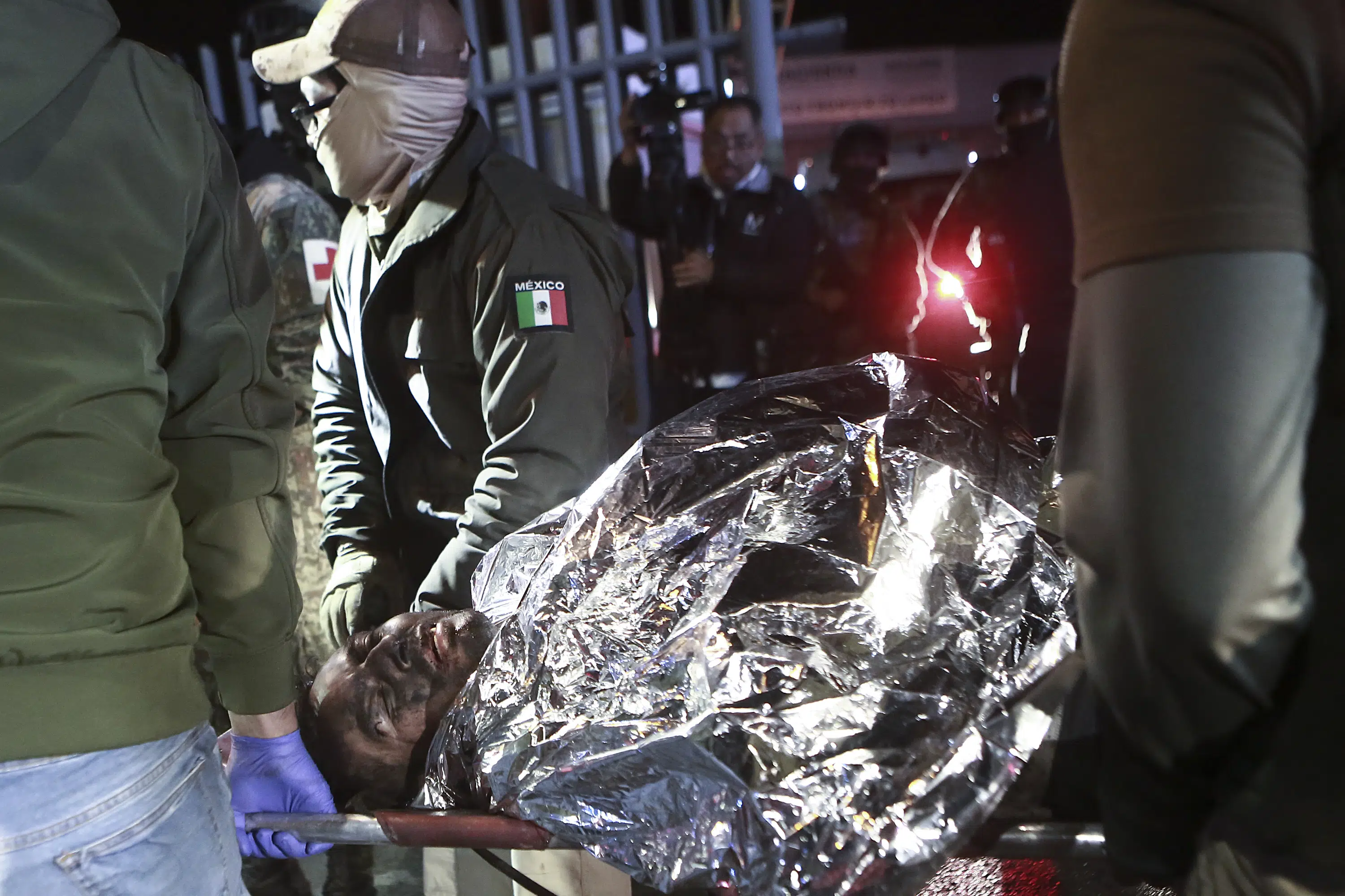Migrants start fire at Mexico detention center, killing 40