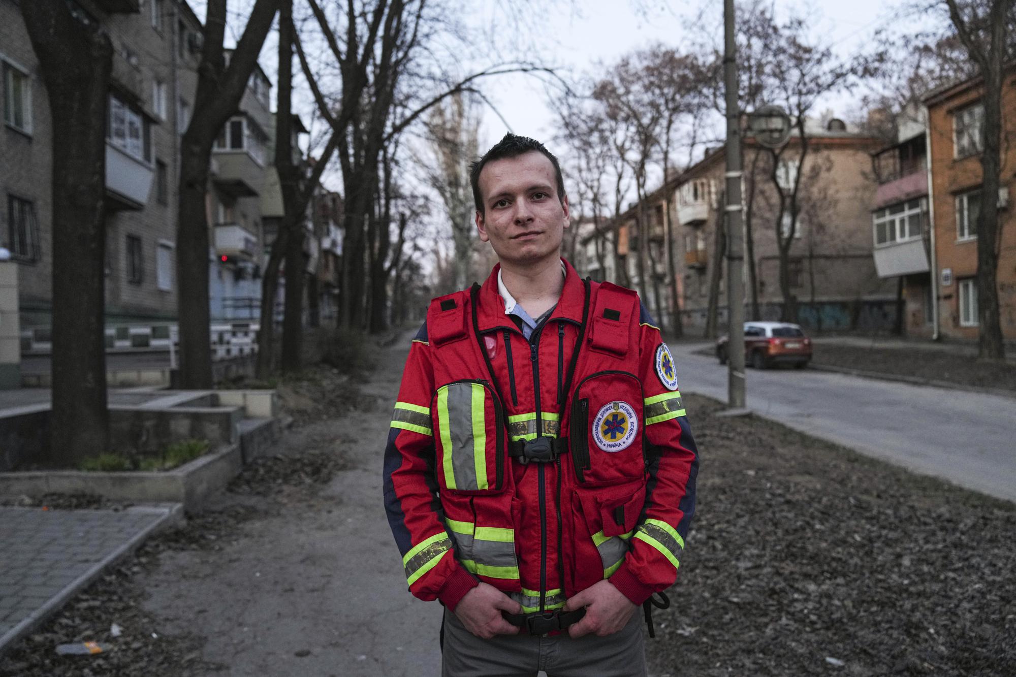Sergei Chernobrivets, a paramedic, poses for a photo on March 23, 2022, in Zaporizhzhia, Ukraine. Chernobrivets, who was on the scene March 9 after the Russian airstrike on a maternity hospital, described the injuries to multiple women. (AP Photo/Evgeniy Maloletka)