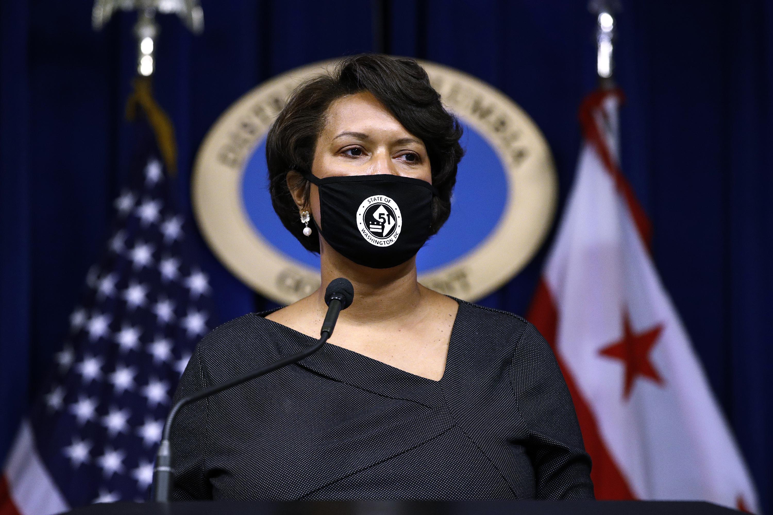 D.C. brings back indoor mask mandate amid surging infections AP News
