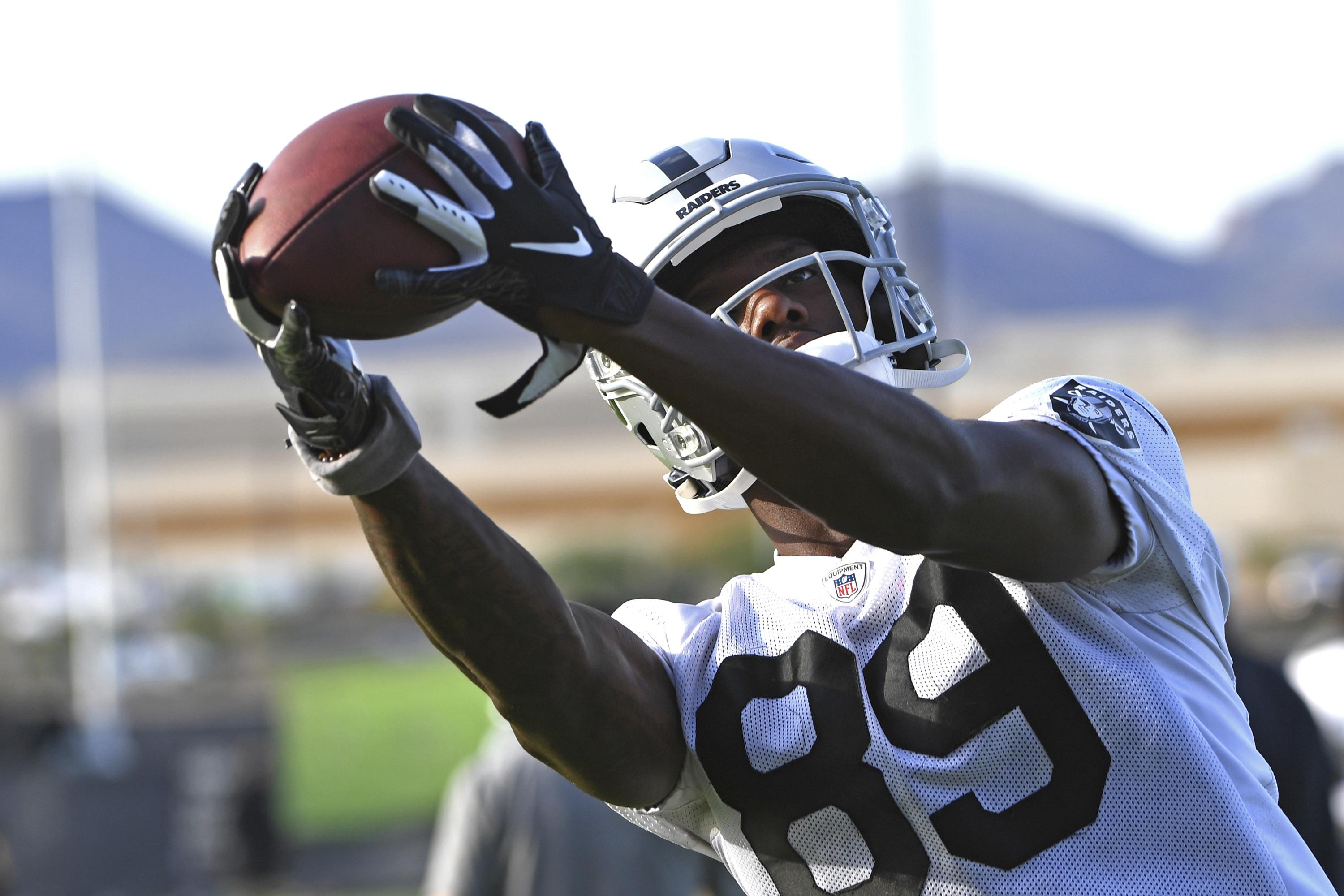 Raiders' receivers ready to produce in highflying offense AP News