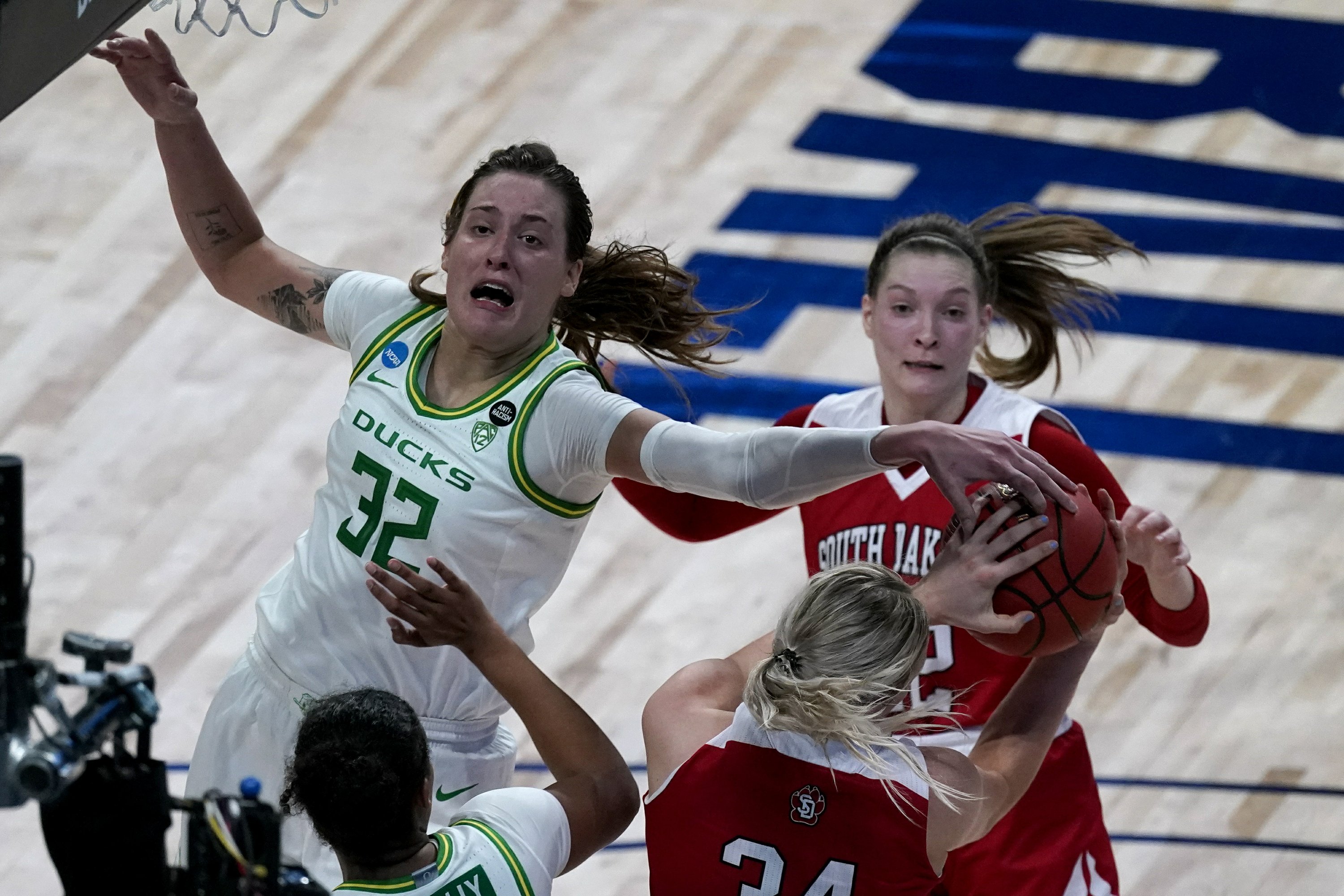 Belmont program founder virtually cheering Bruins' run | AP News