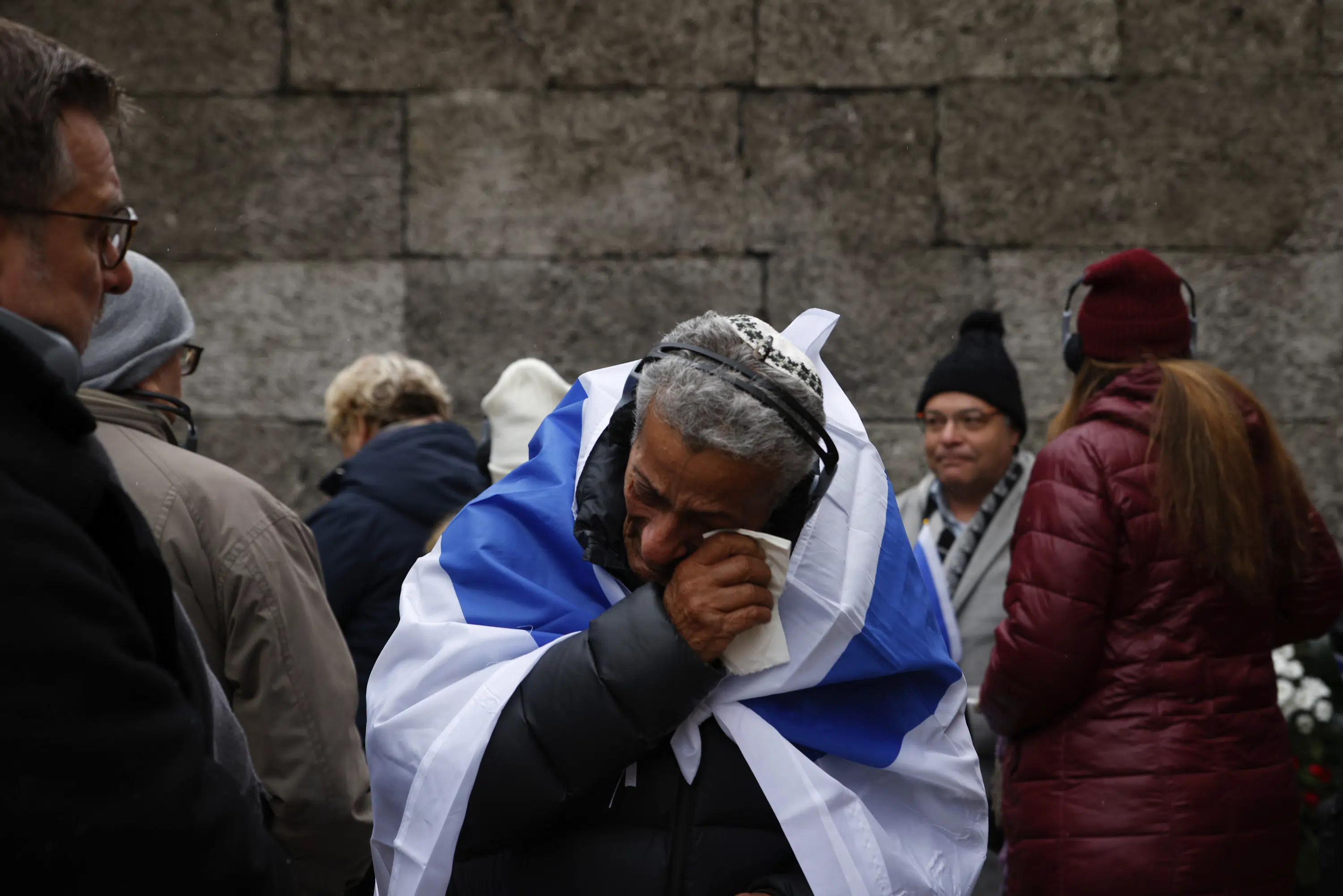 Auschwitz anniversary marked as peace again shattered by war - The Associated Press