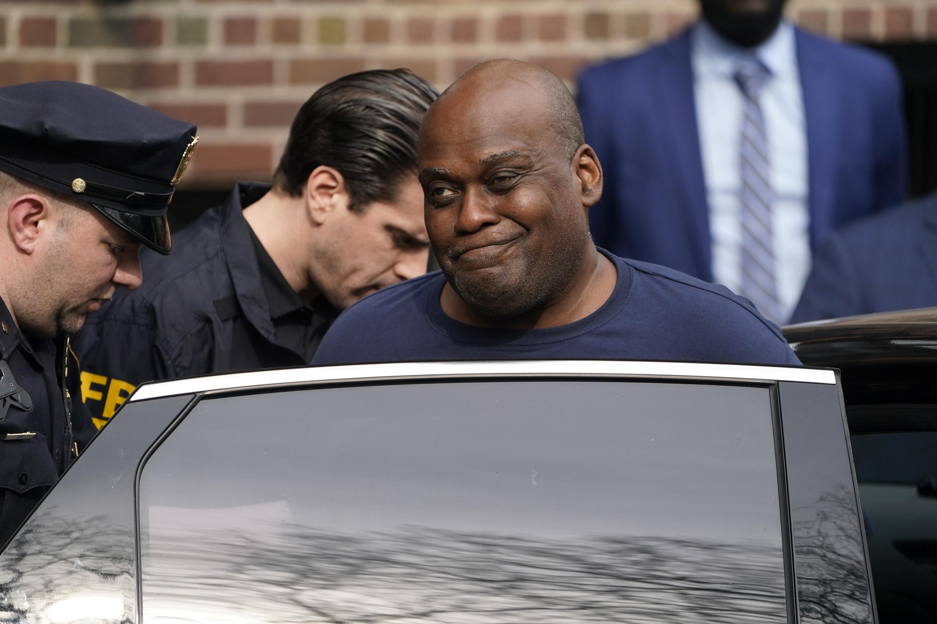 Lawyers spar over DNA swab on suspect in NYC subway shooting | AP News