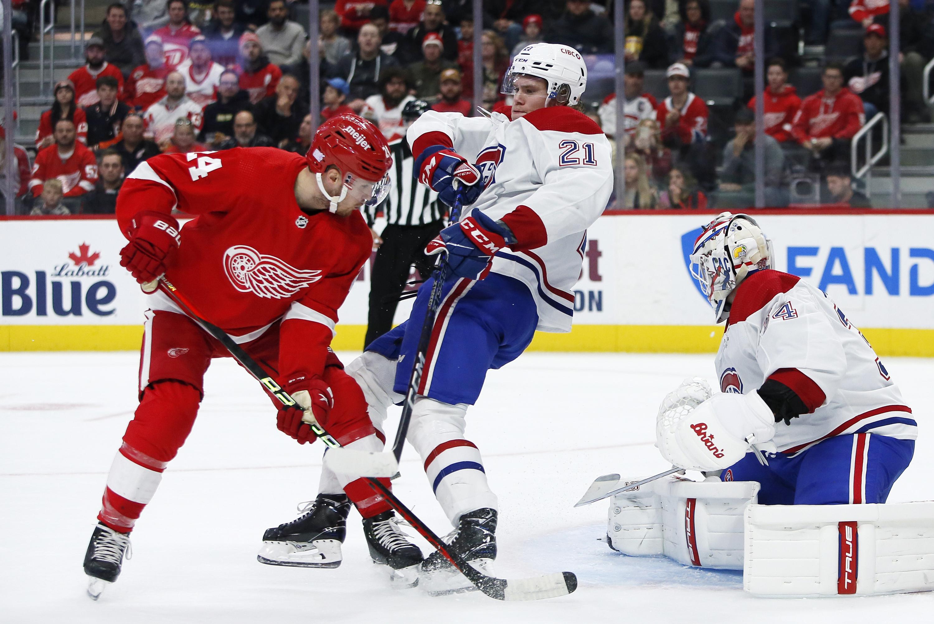 Caufield, Suzuki score in shootout, Canadiens beat Red Wings | AP News