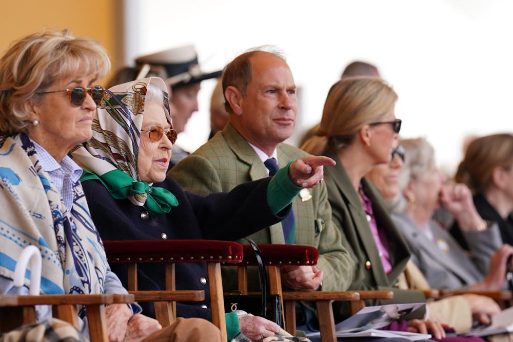 Britain's Queen Elizabeth II is joined by Prince Edward and Sophie, right, the Earl and Countess of Wessex as they sit in the Royal Box at the Royal Windsor Horse Show, Windsor, England, Friday May 13, 2022. The Queen's appearance at the Royal Windsor Horse Show came a few days after she delegated the opening of Parliament to Prince Charles. (Steve Parsons/PA via AP)