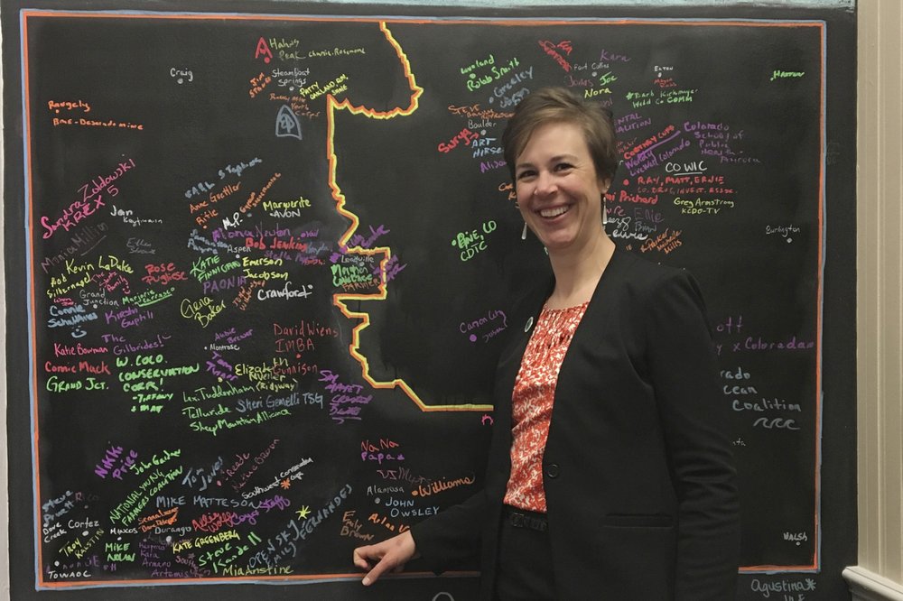 This March 2019 photo provided by the Colorado Association of Local Public Health Officials shows Emily Brown, director for the Rio Grande County Public Health department in rural Colorado. A May 2020 Facebook post showed a photo of her and other health officials with comments about their weight and references to 