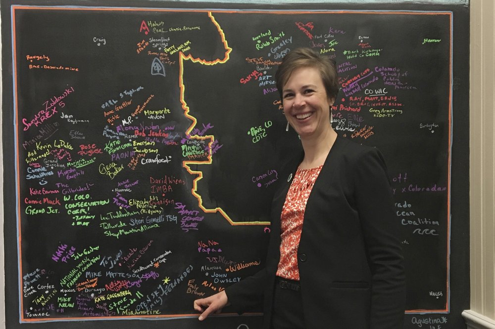 This March 2019 photo provided by the Colorado Association of Local Public Health Officials shows Emily Brown, director for the Rio Grande County Public Health department in rural Colorado. A May 2020 Facebook post showed a photo of her and other health officials with comments about their weight and references to