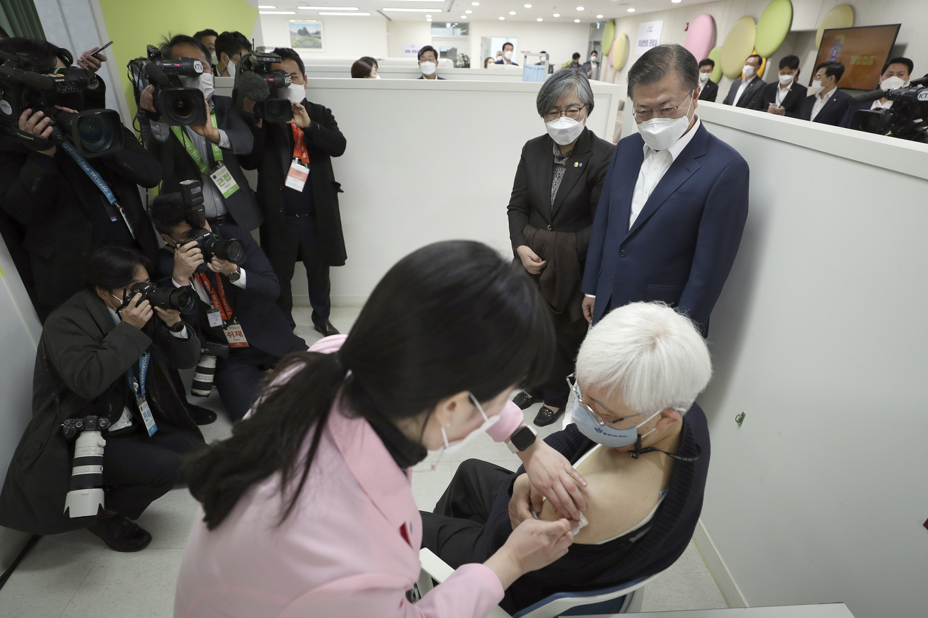 1st vaccines reach arms in S. Korea, Hong Kong