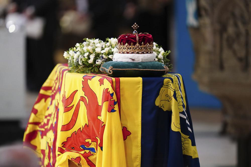 The Crown of Scotland sits atop the coffin of Queen Elizabeth II during a Service of Prayer and Reflection for her life at St Giles' Cathedral, Edinburgh, Monday, Sept. 12, 2022. (Jane Barlow/PA via AP)