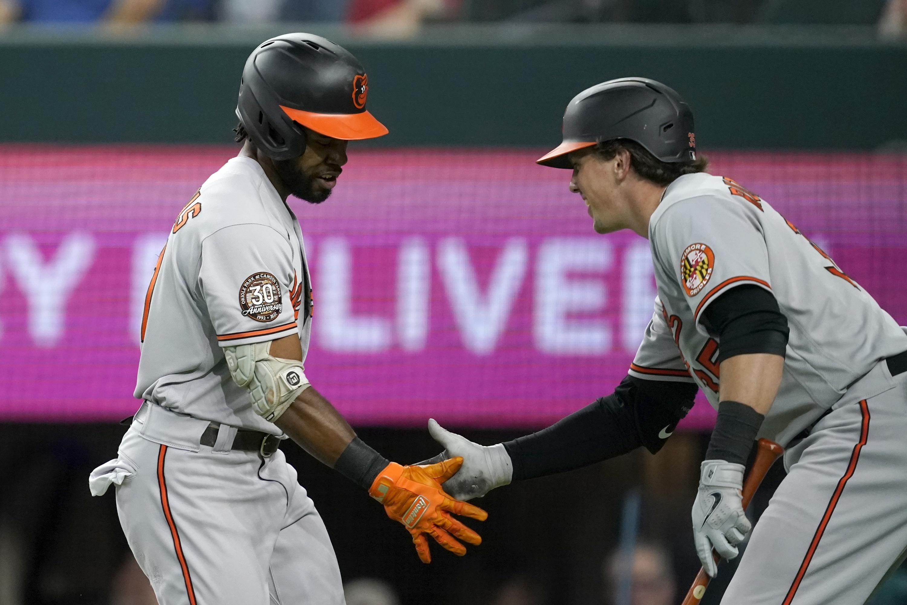 Orioles trade Mancini, then beat Texas 7-2 to match ’21 wins