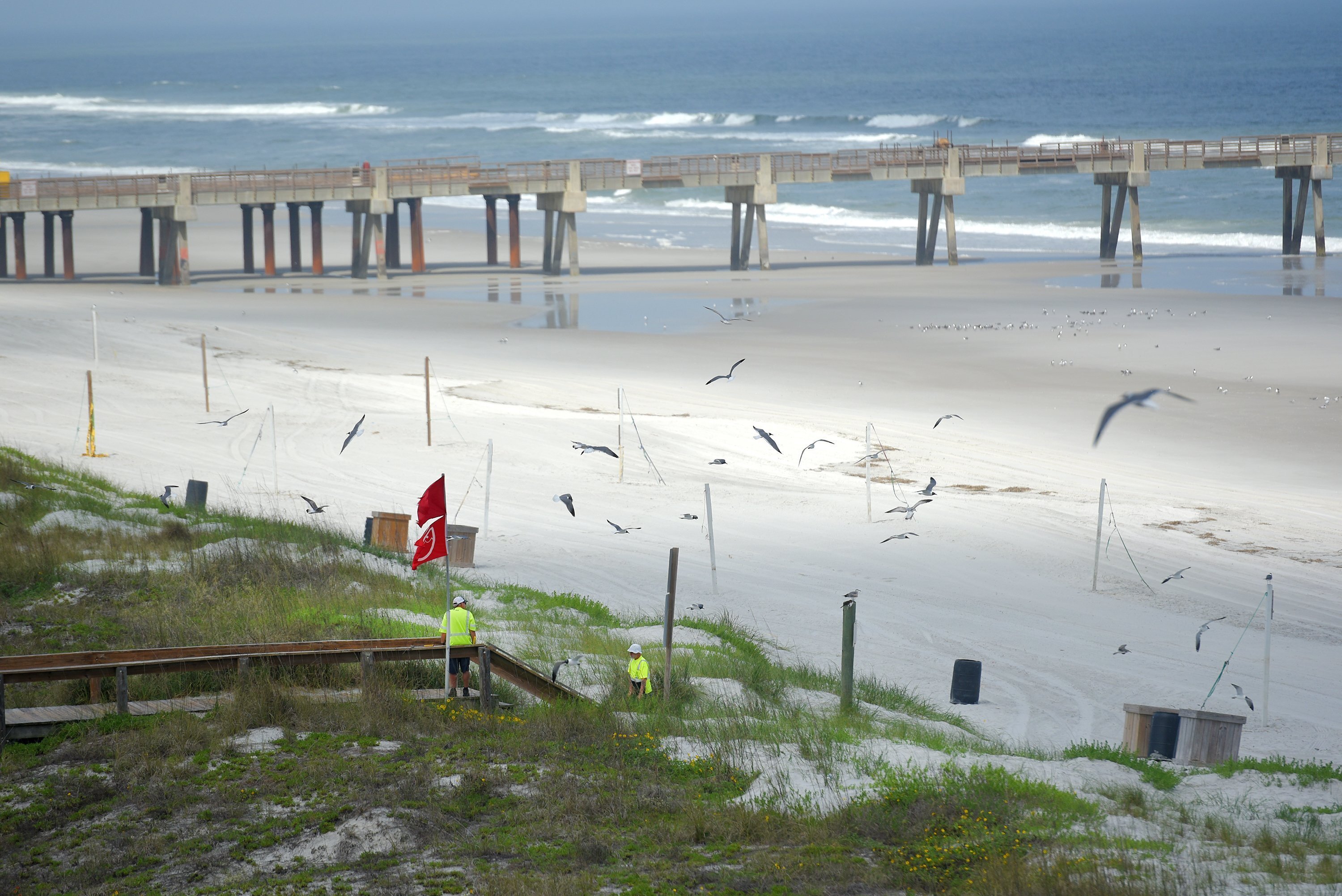 and north Florida beaches became among the first to allow people to return ...