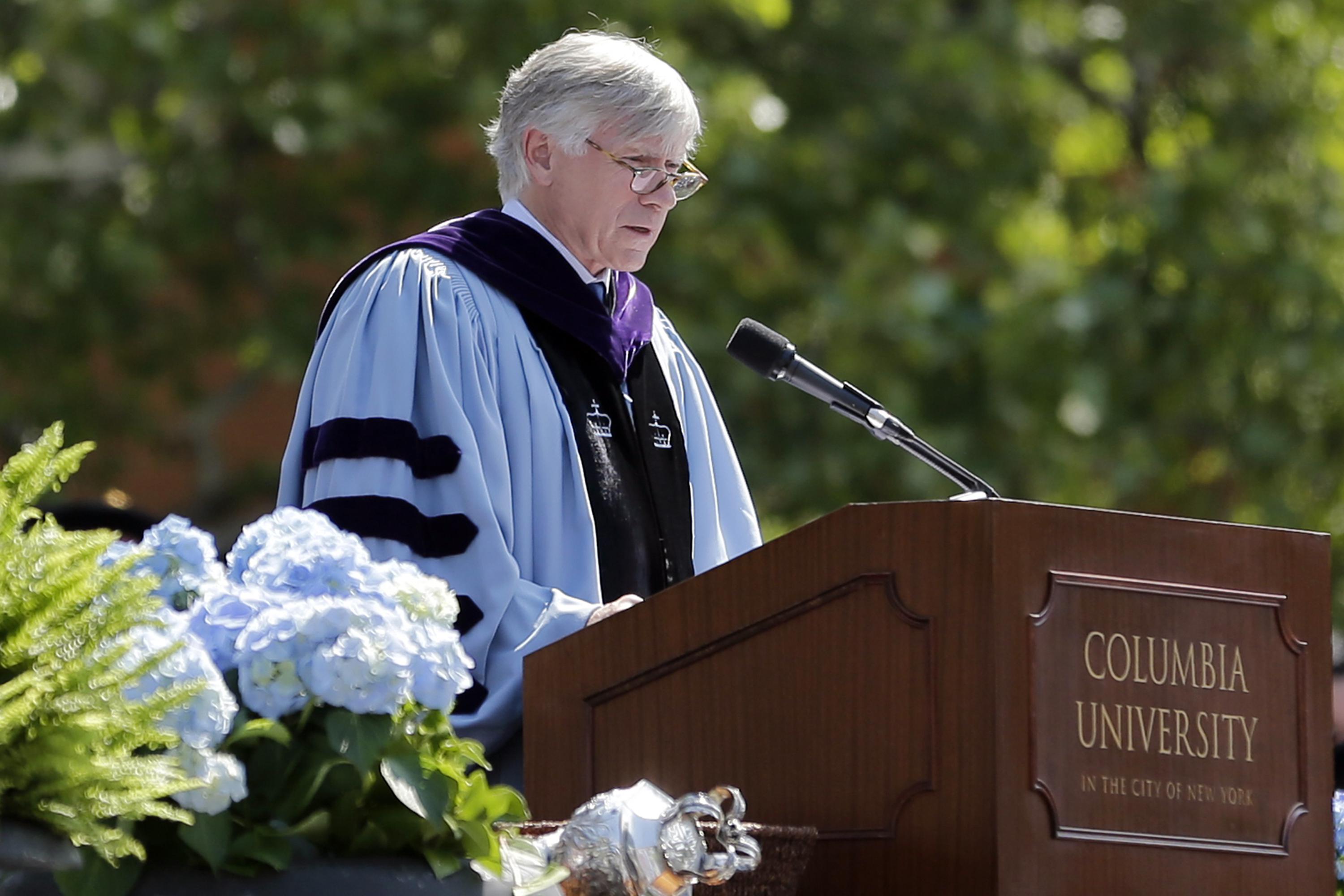 Columbia University president says he'll retire in June 2023 AP News