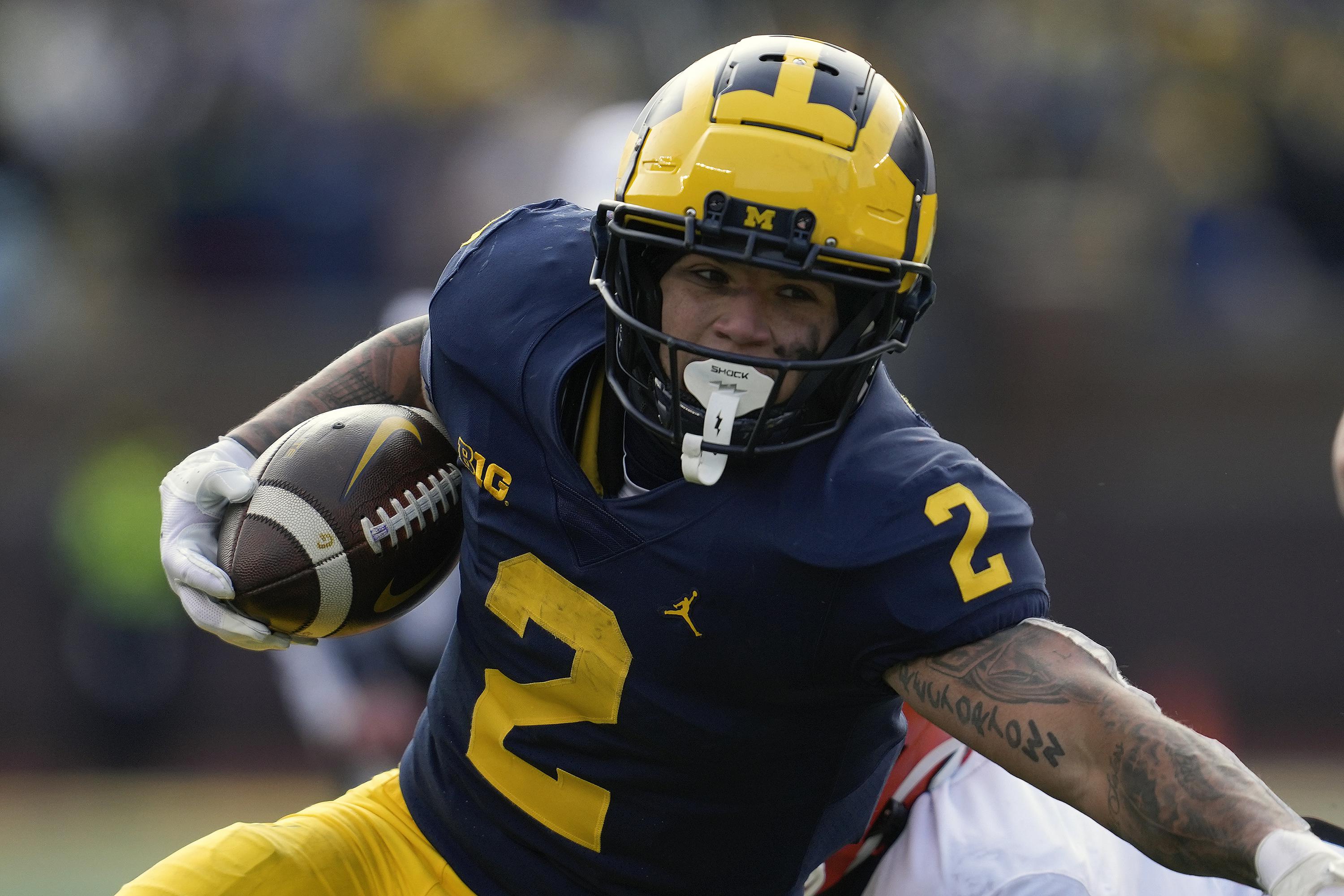 Michigan All-America RB Blake Corum staying for senior year | AP News