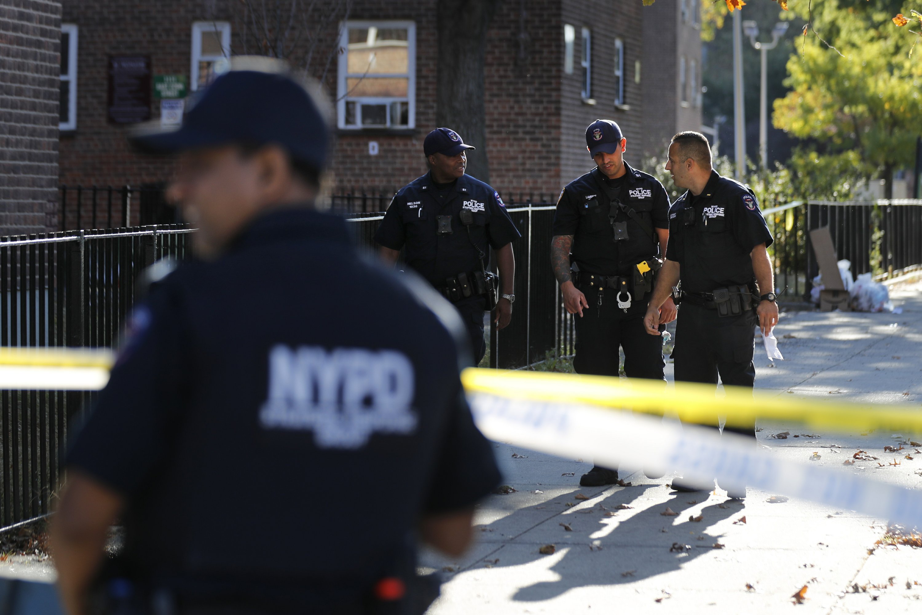 NYPD officer shot and killed during struggle with suspect | AP News