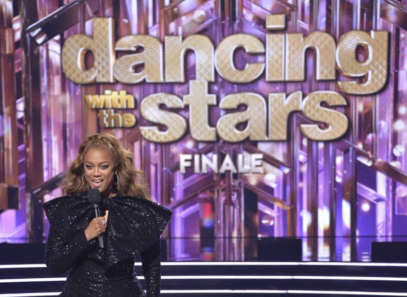 This mage released by ABC shows host Tyra Banks during last season's finale of "Dancing with the Stars." The competition series, which debuted on the broadcast network in 2005, will be on Disney+ starting this fall in the U.S. and Canada, the company announced Friday. (Eric McCandless/ABC via AP)