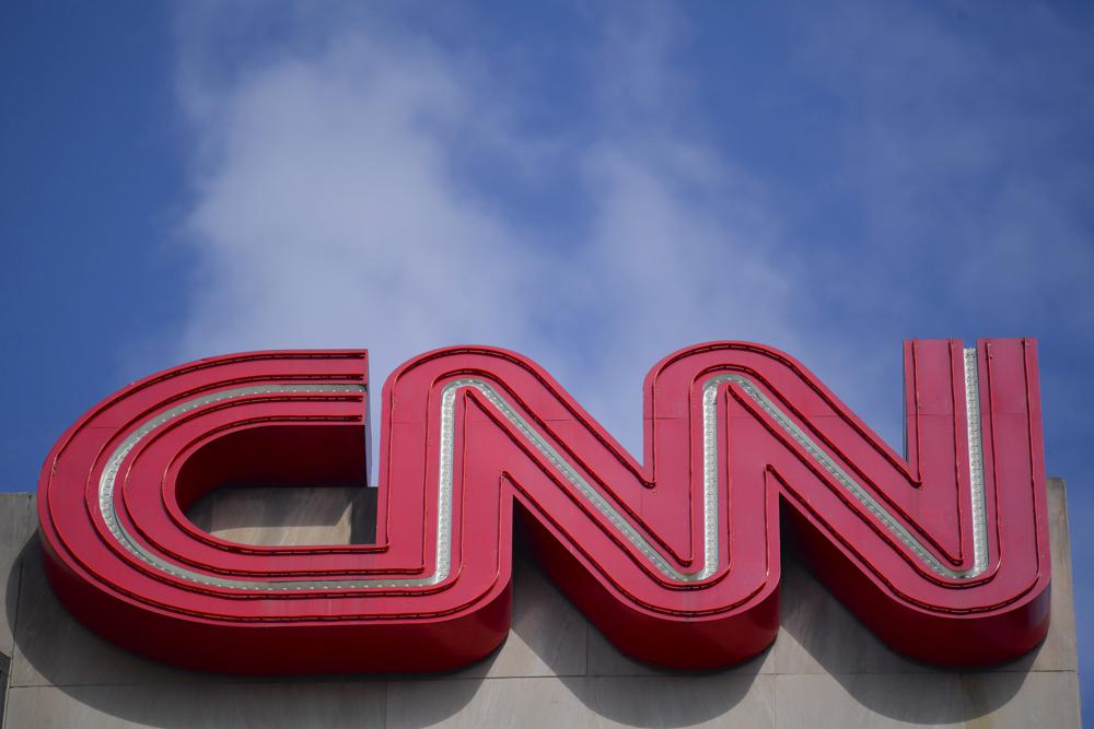 Signage is seen at CNN center, Thursday, April 21, 2022, in Atlanta. The pantheon of colossal business failures has a new member in the CNN+ streaming service. The news network's subscription offering hadn't even been operating for a month before Warner Bros. Discovery announced this week that it would be shutting down on April 30. (AP Photo/Mike Stewart)