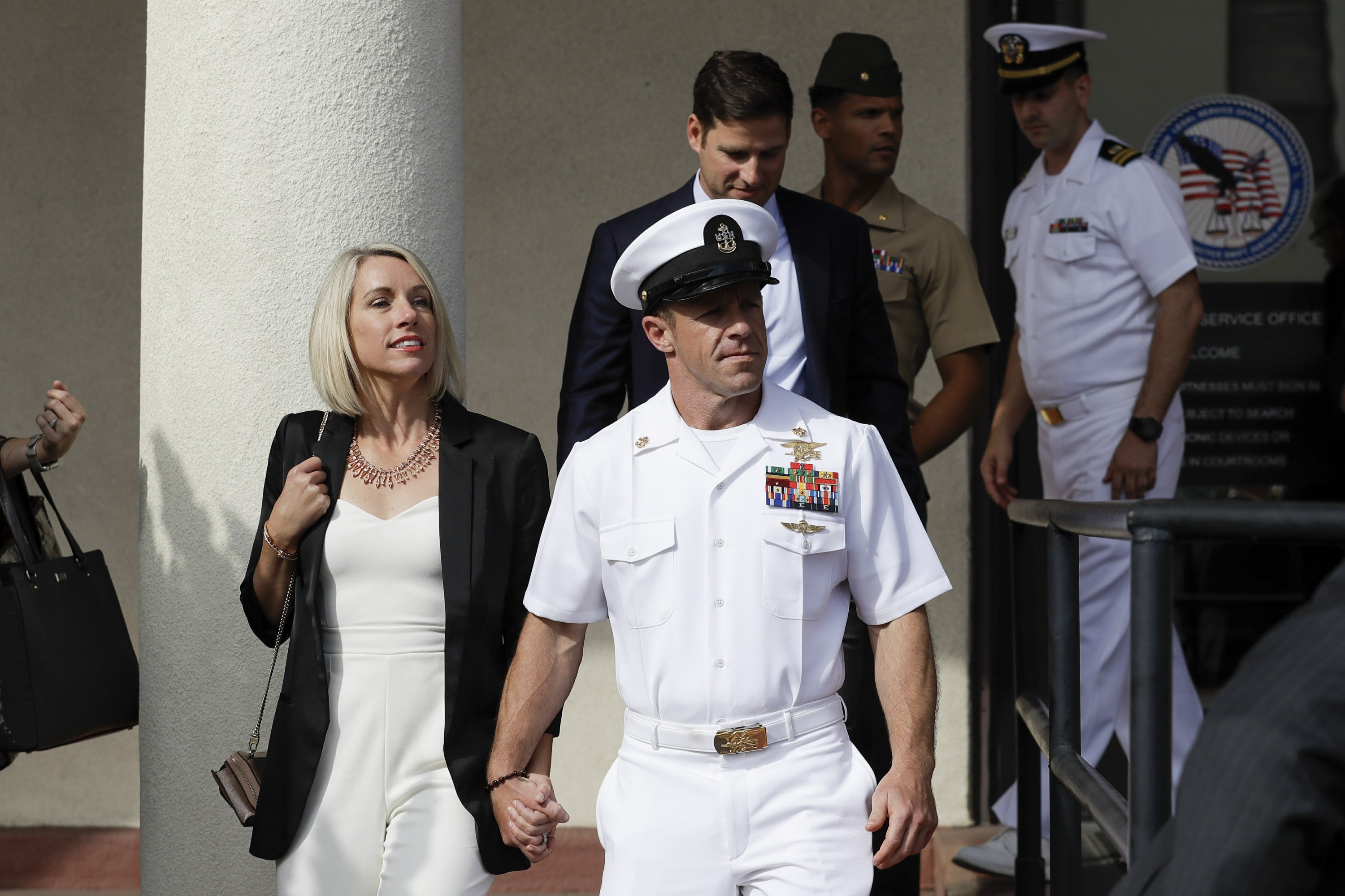 The Latest Navy SEAL sentenced for posing with dead captive AP News