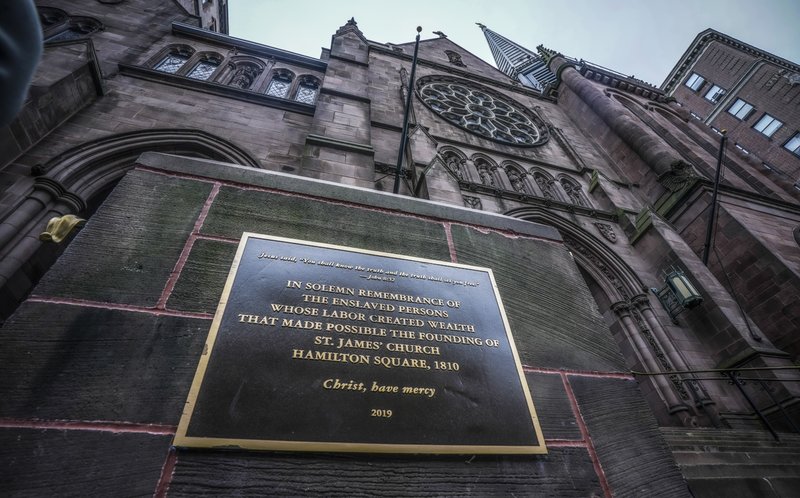 A plaque sits at the steps of St James Episcopal Church in New York