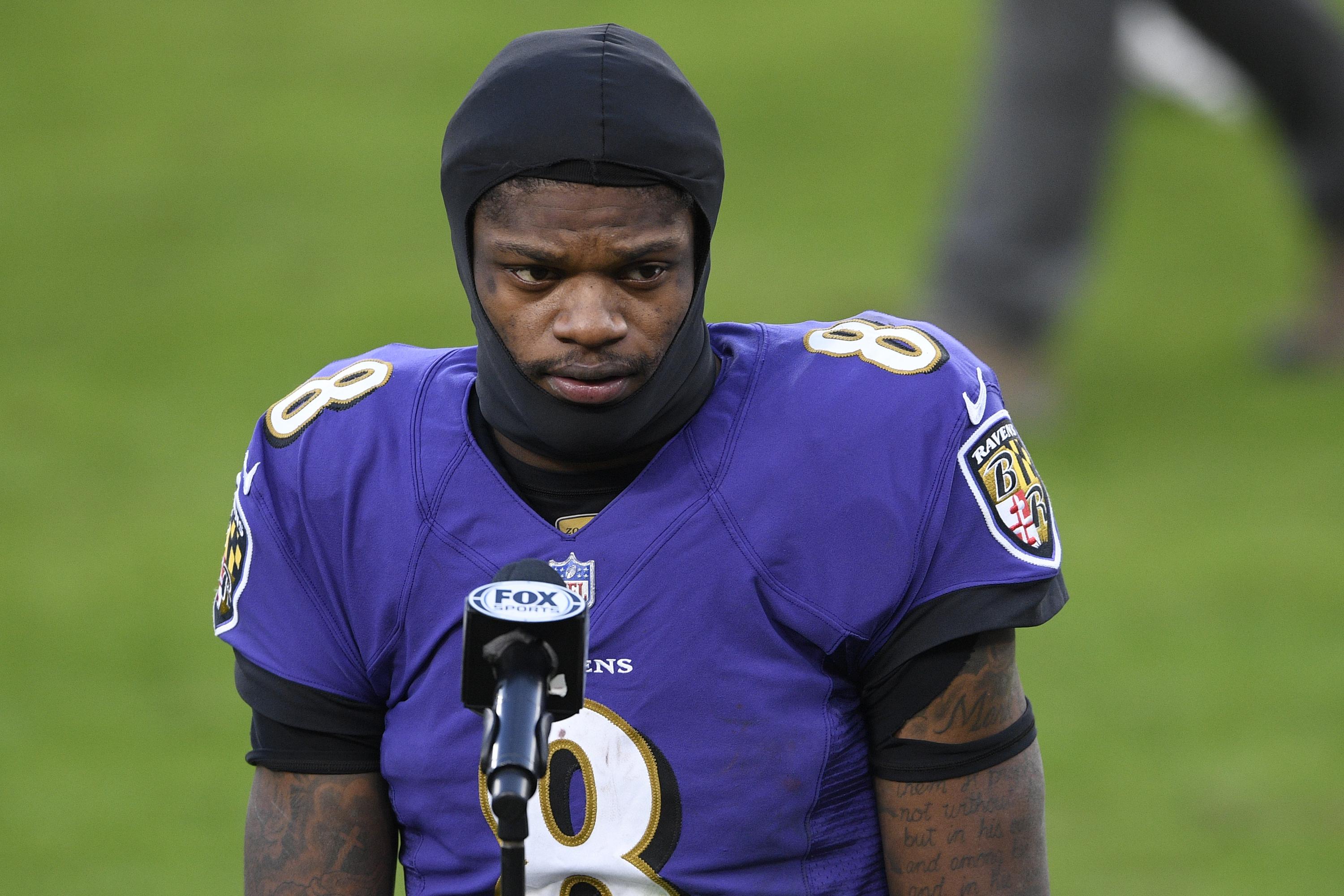 Ravens QB Lamar Jackson tests positive for COVID-19 | AP News