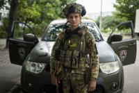 Ukrainian medic Serhiy Chornobryvets poses for a photo on Aug. 20, 2022, in Kharkiv, Ukraine. Chornobryvets, who won praise for his bravery in the siege of Mariupol, now works to save soldiers on the front lines of Ukraine's war with Russia. (AP Photo/Evgeniy Maloletka)