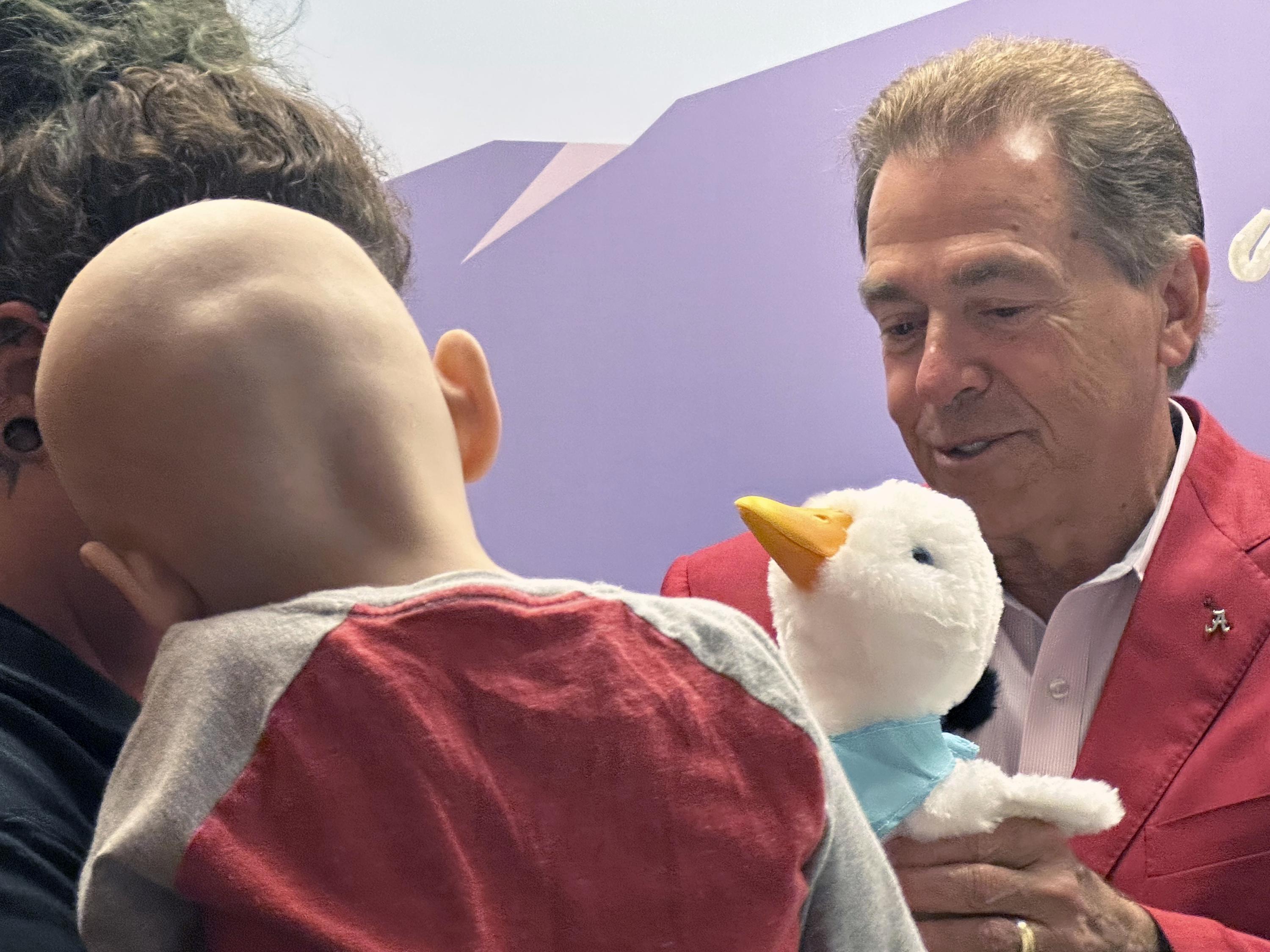 Alabama’s Nick Saban visits kids with cancer, next up a lobbying trip to Washington