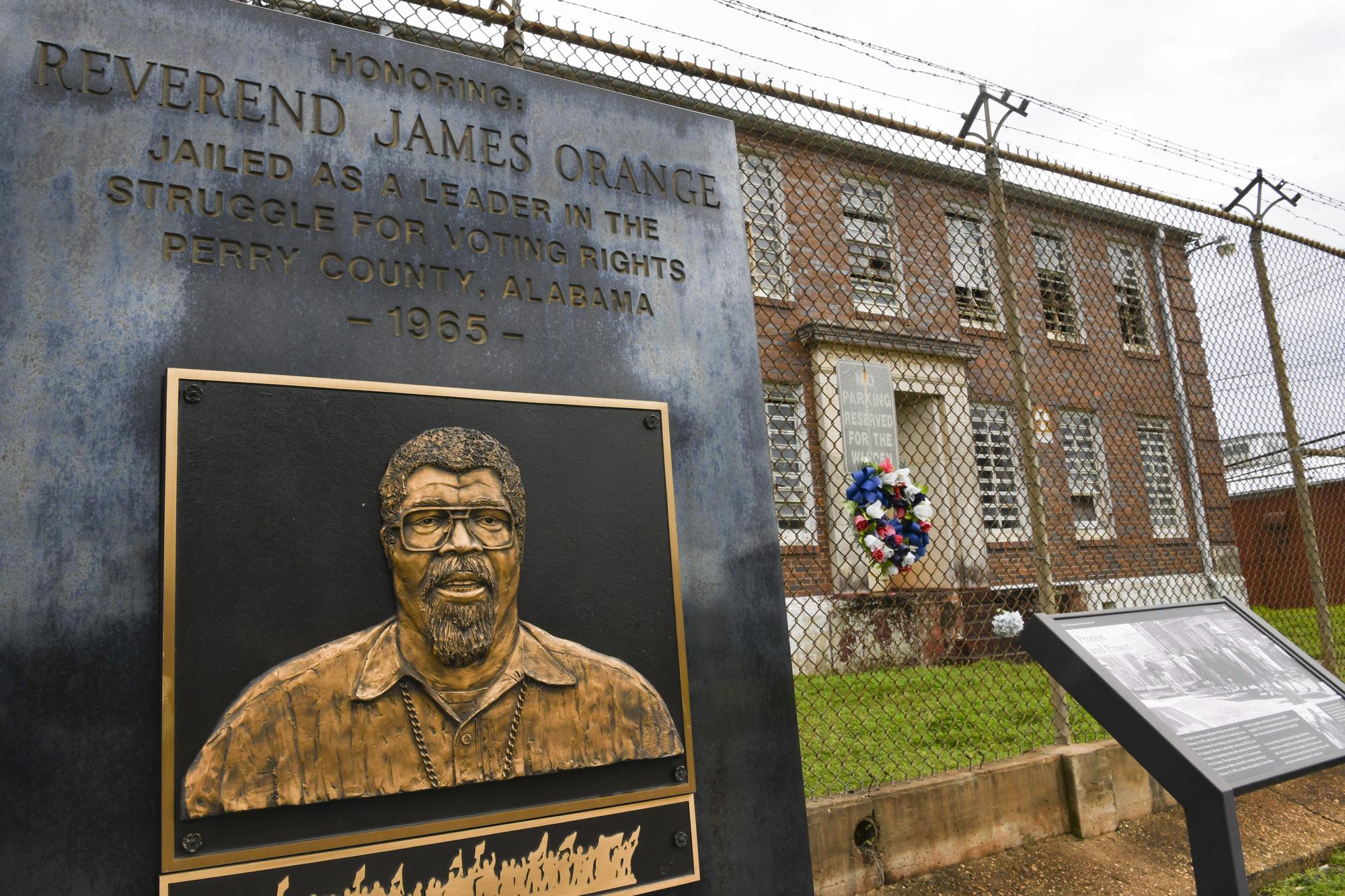 FILE - A monument honoring the Rev. James Orange, a project coordinator for the Southern Christian Leadership Conference, is photographed outside the Perry County Jail in Marion, Ala., on Feb. 16, 2020. Orange was arrested in 1965 while organizing a voter registration drive in Marion, Ala. He was held on charges of disorderly conduct and contributing to the delinquency of minors. (AP Photo/Julie Bennett, File)