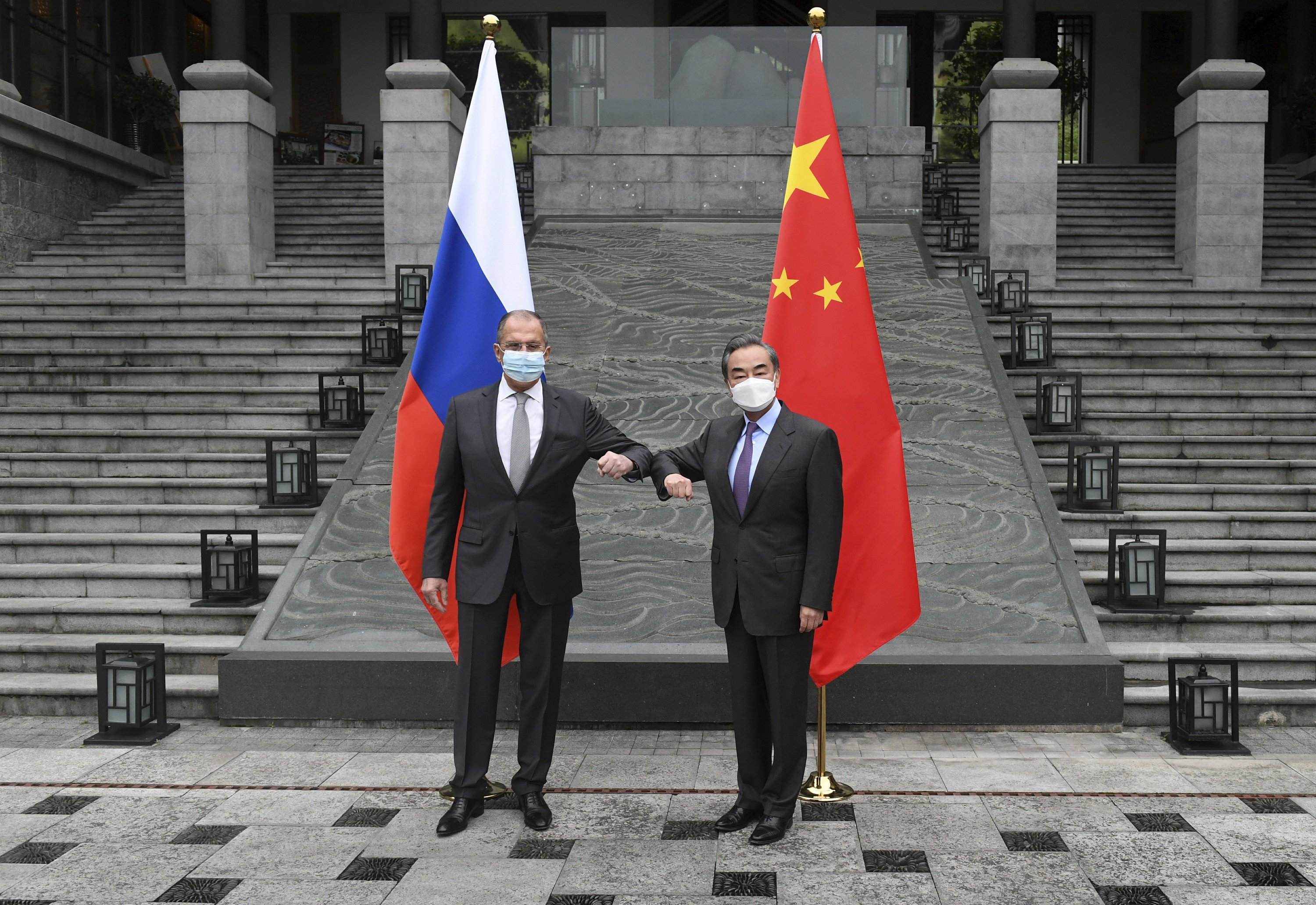 Chinese and Russian officials are meeting in unity against the EU and the US